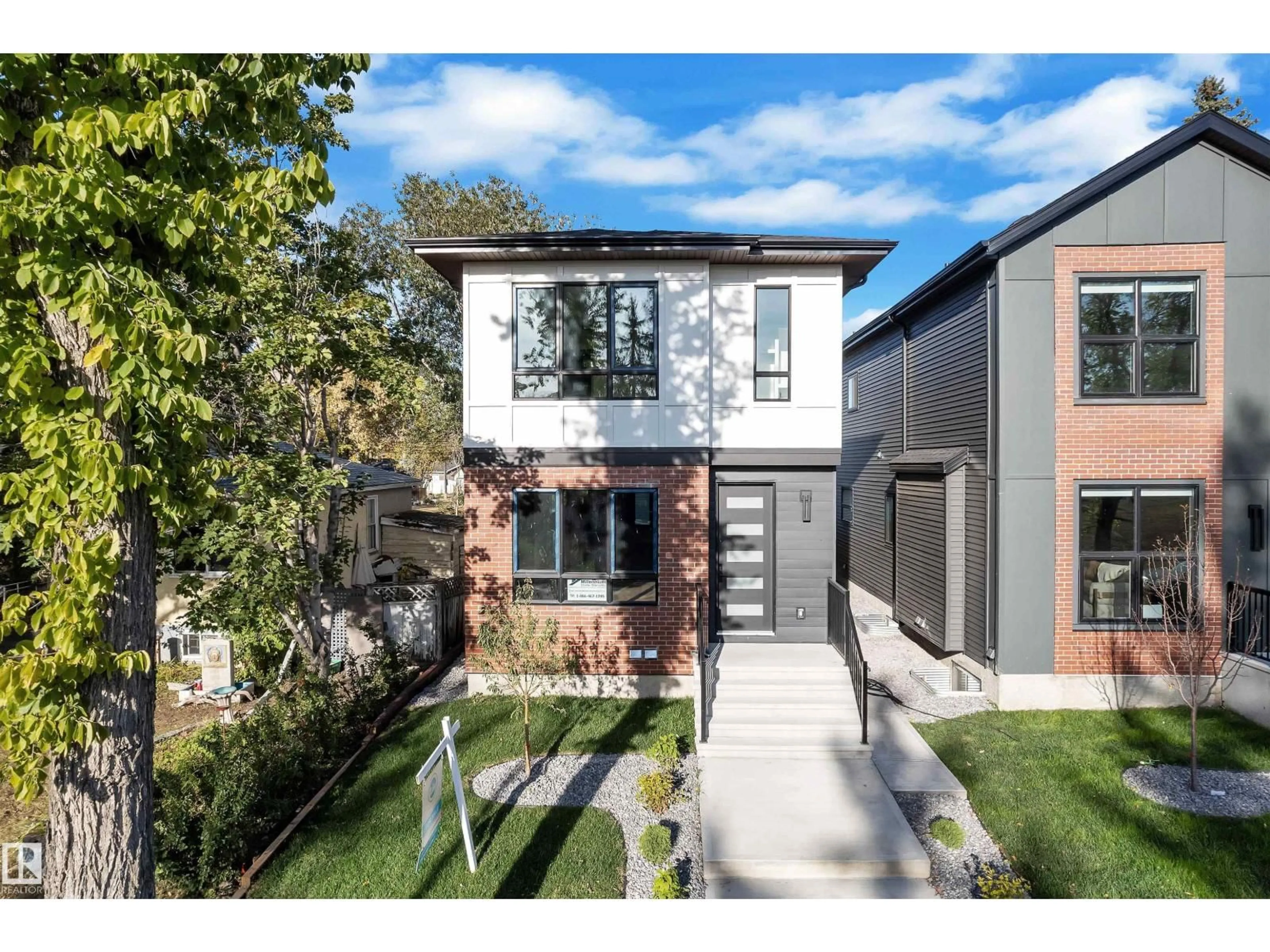 Home with brick exterior material, street for NW - 10725 132 ST, Edmonton Alberta T5M1C8