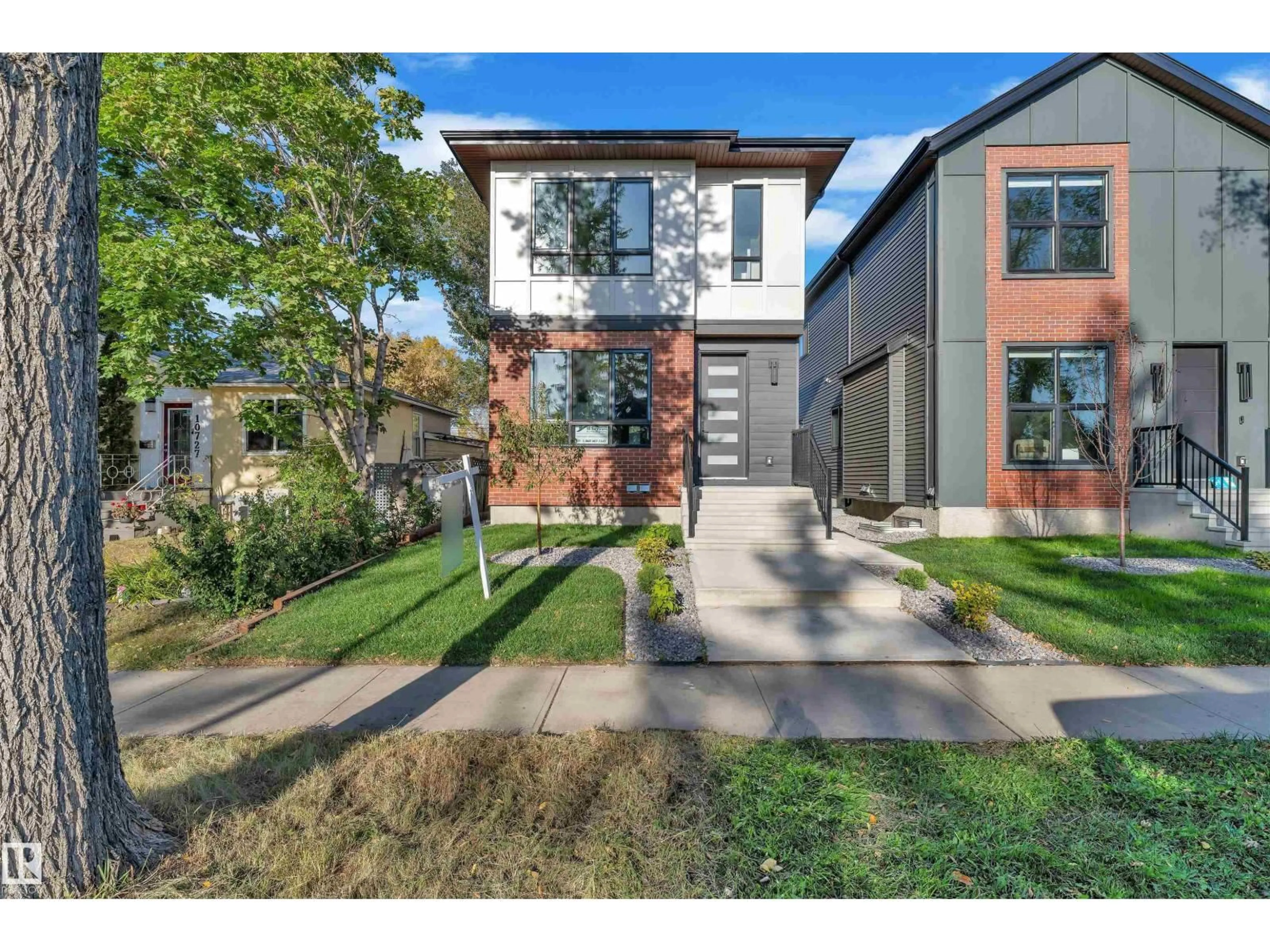 Home with brick exterior material, street for NW - 10725 132 ST, Edmonton Alberta T5M1C8