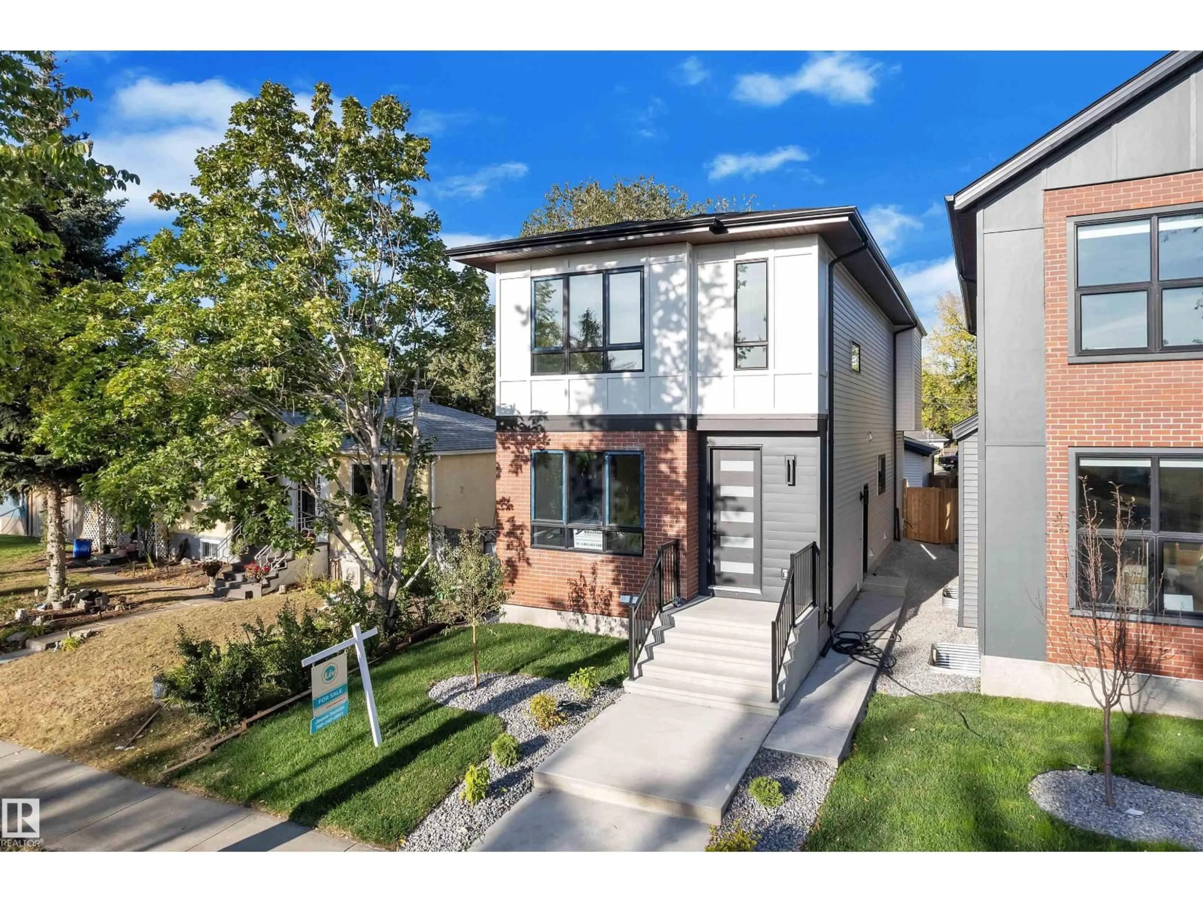 Home with brick exterior material, street for NW - 10725 132 ST, Edmonton Alberta T5M1C8