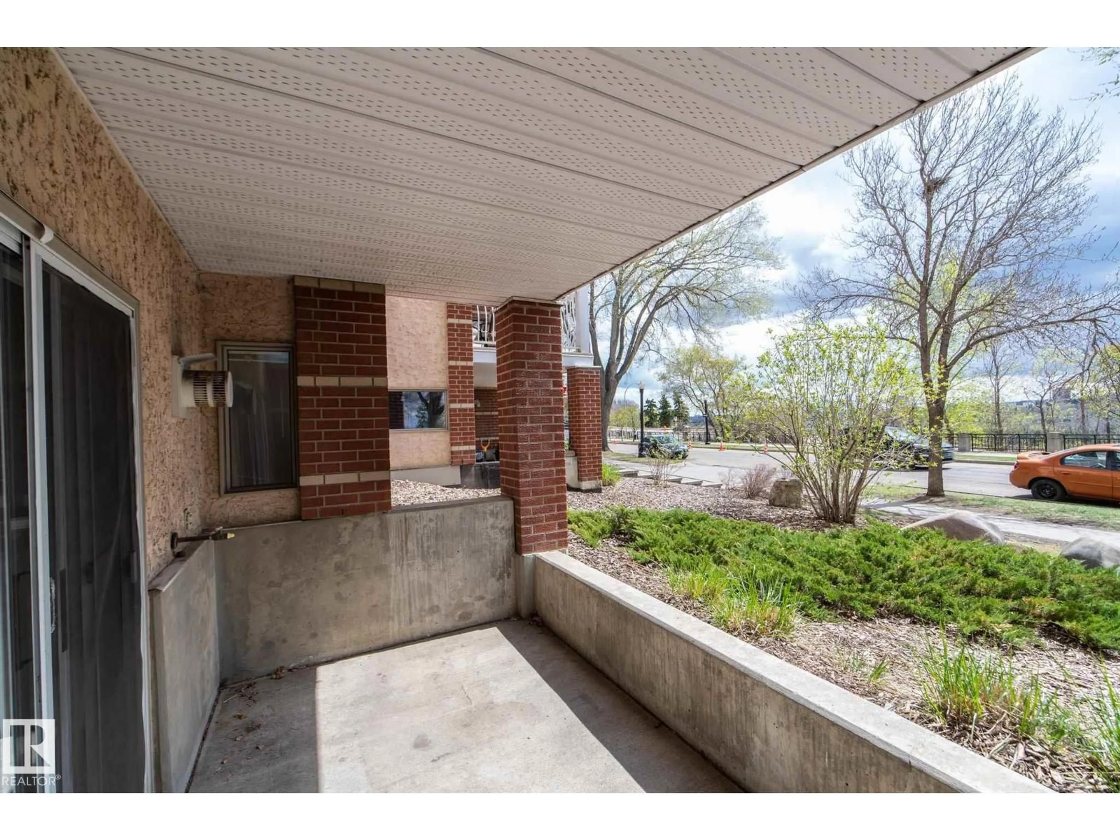 Patio, street for #112 - 11716 100 AV, Edmonton Alberta T5K2G3