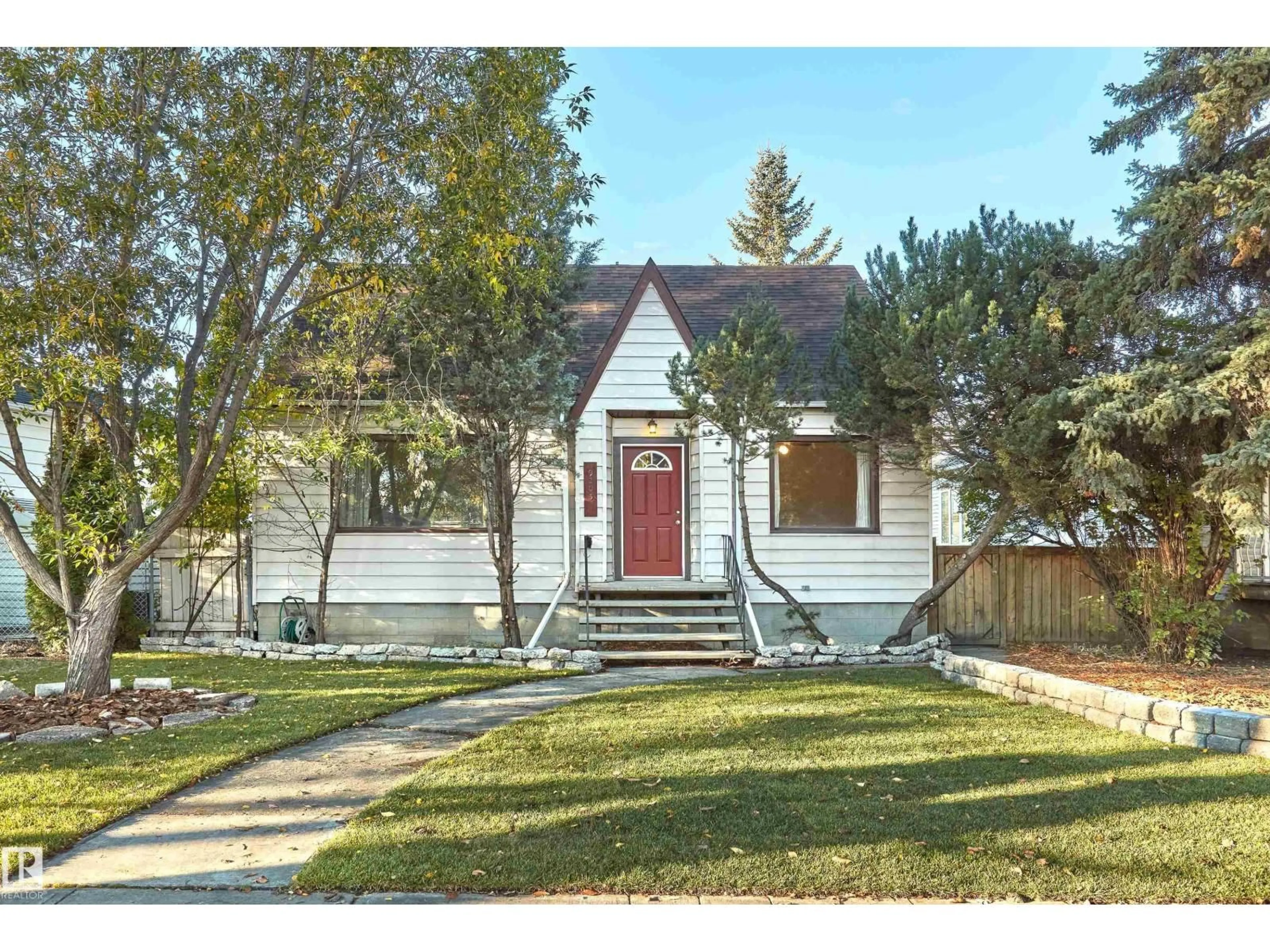 Home with vinyl exterior material, street for 9203 CONNORS RD, Edmonton Alberta T6C4B8