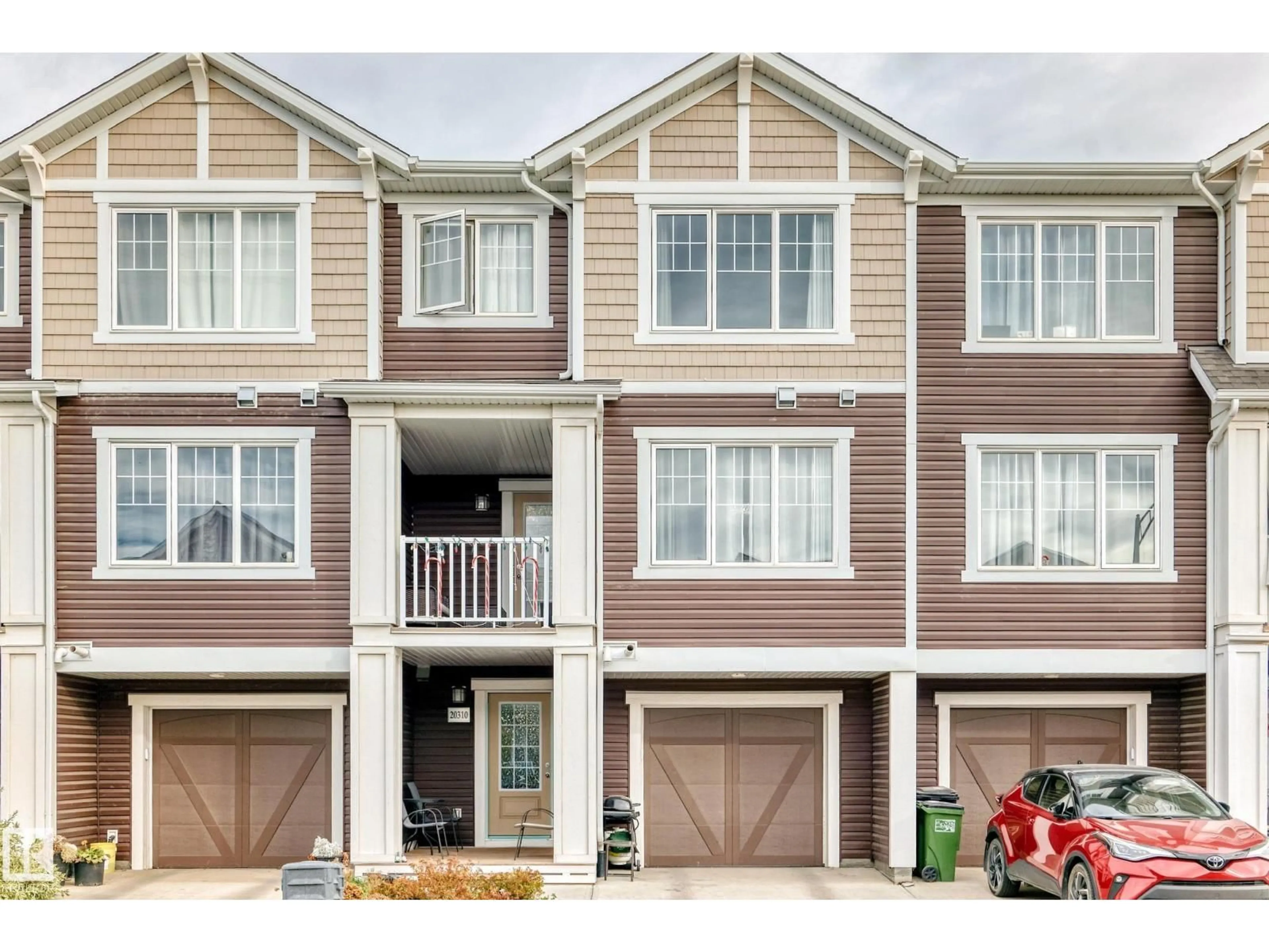 Home with vinyl exterior material, street for 20310 15A AV, Edmonton Alberta T6M1L5