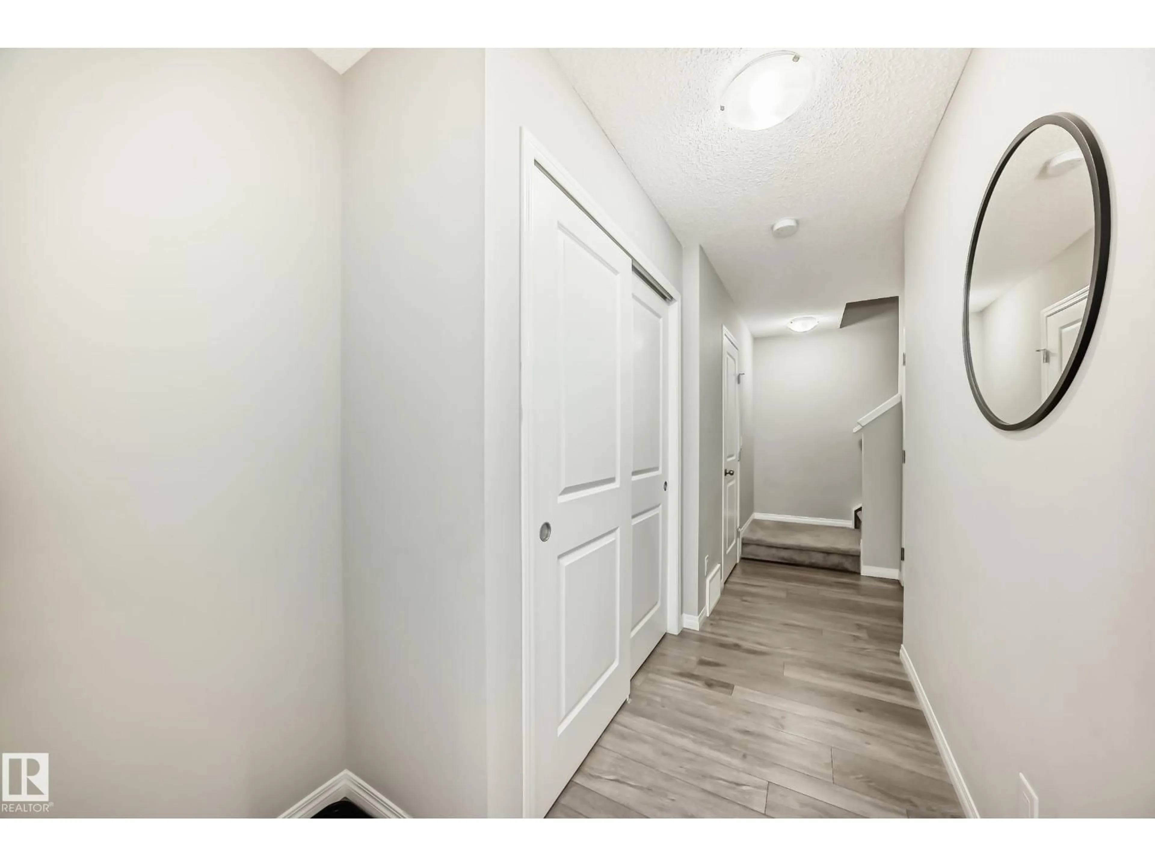 Indoor entryway for 20310 15A AV, Edmonton Alberta T6M1L5