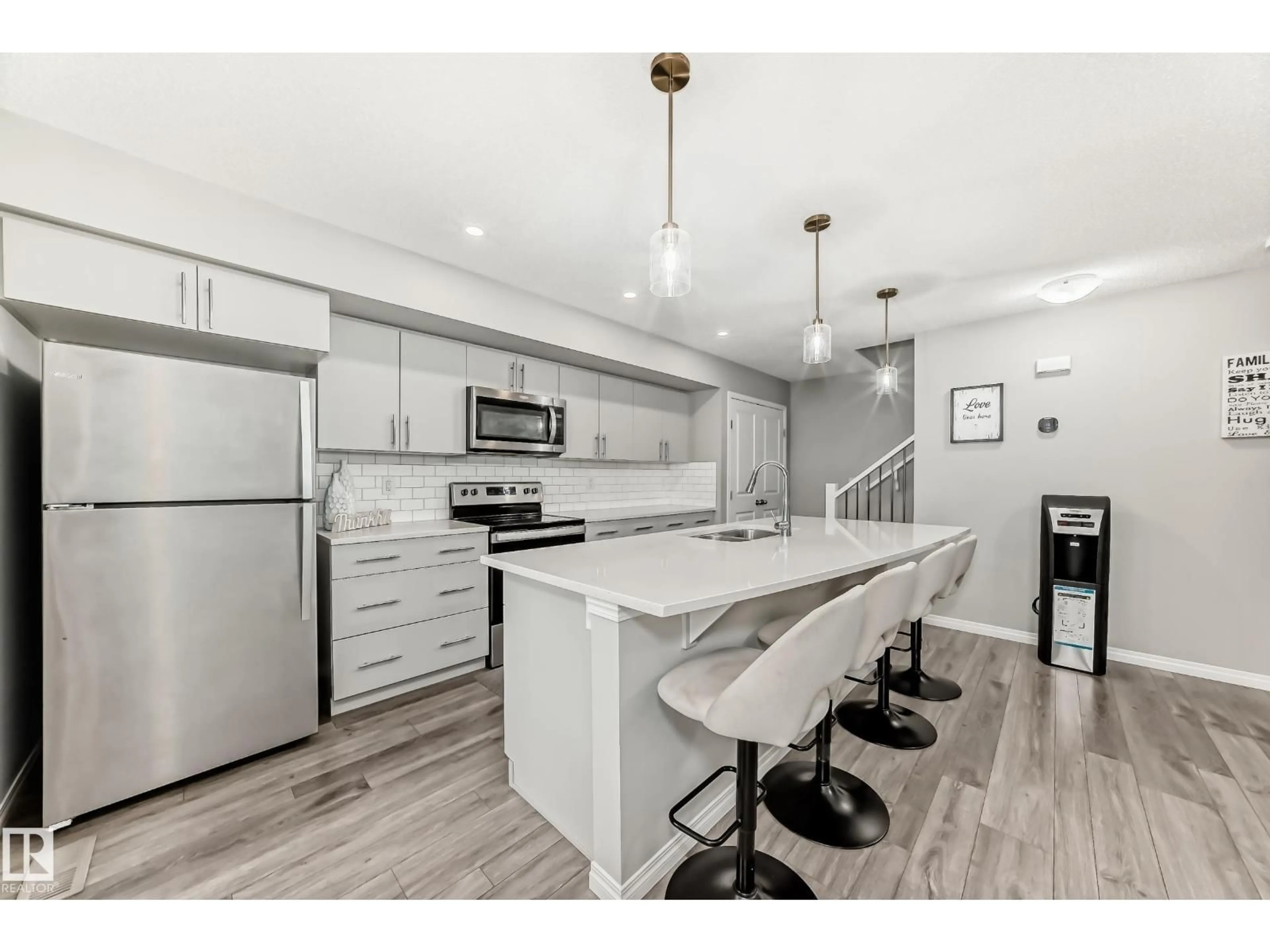 Open concept kitchen, unknown for 20310 15A AV, Edmonton Alberta T6M1L5