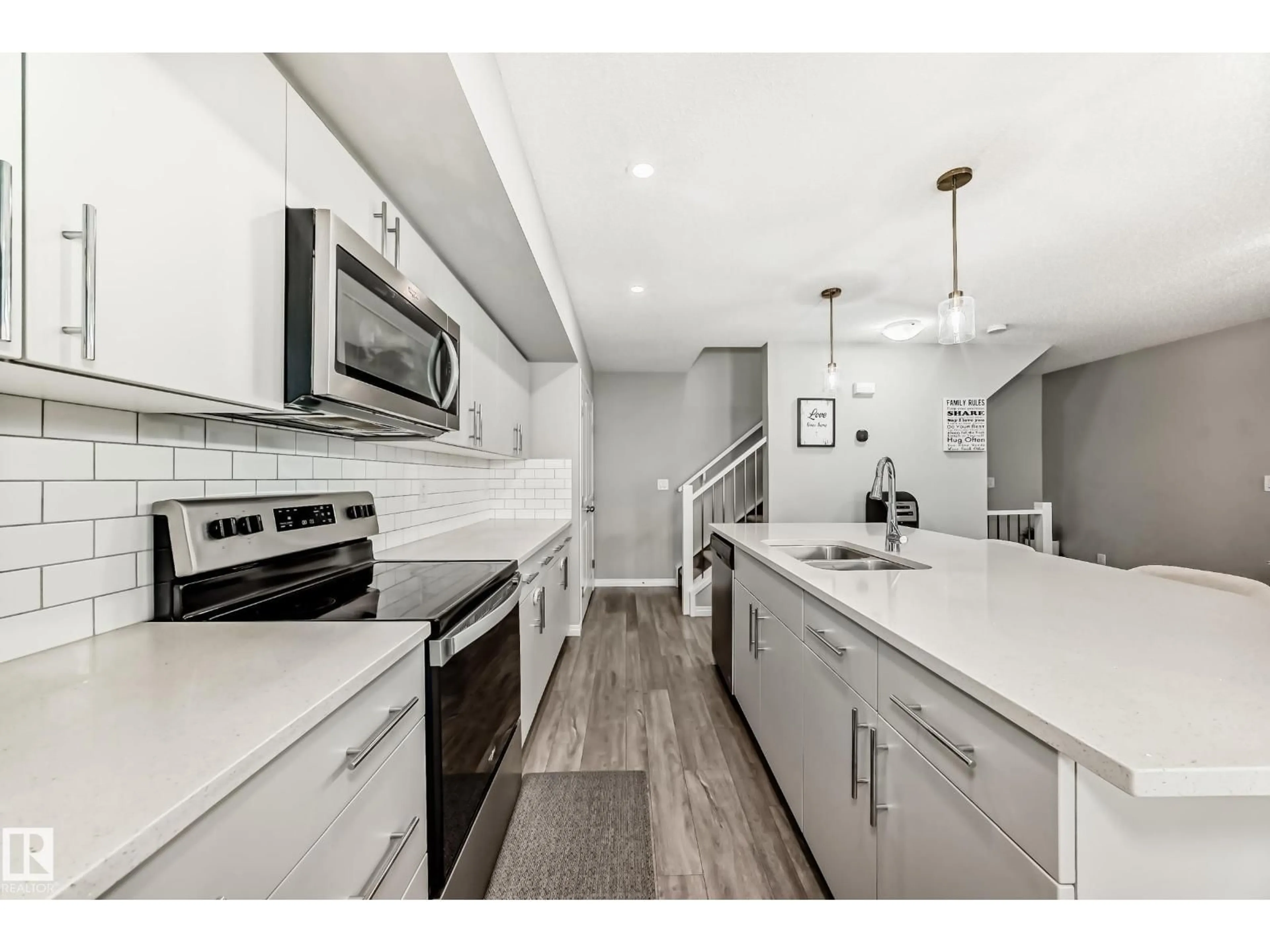 Open concept kitchen, unknown for 20310 15A AV, Edmonton Alberta T6M1L5