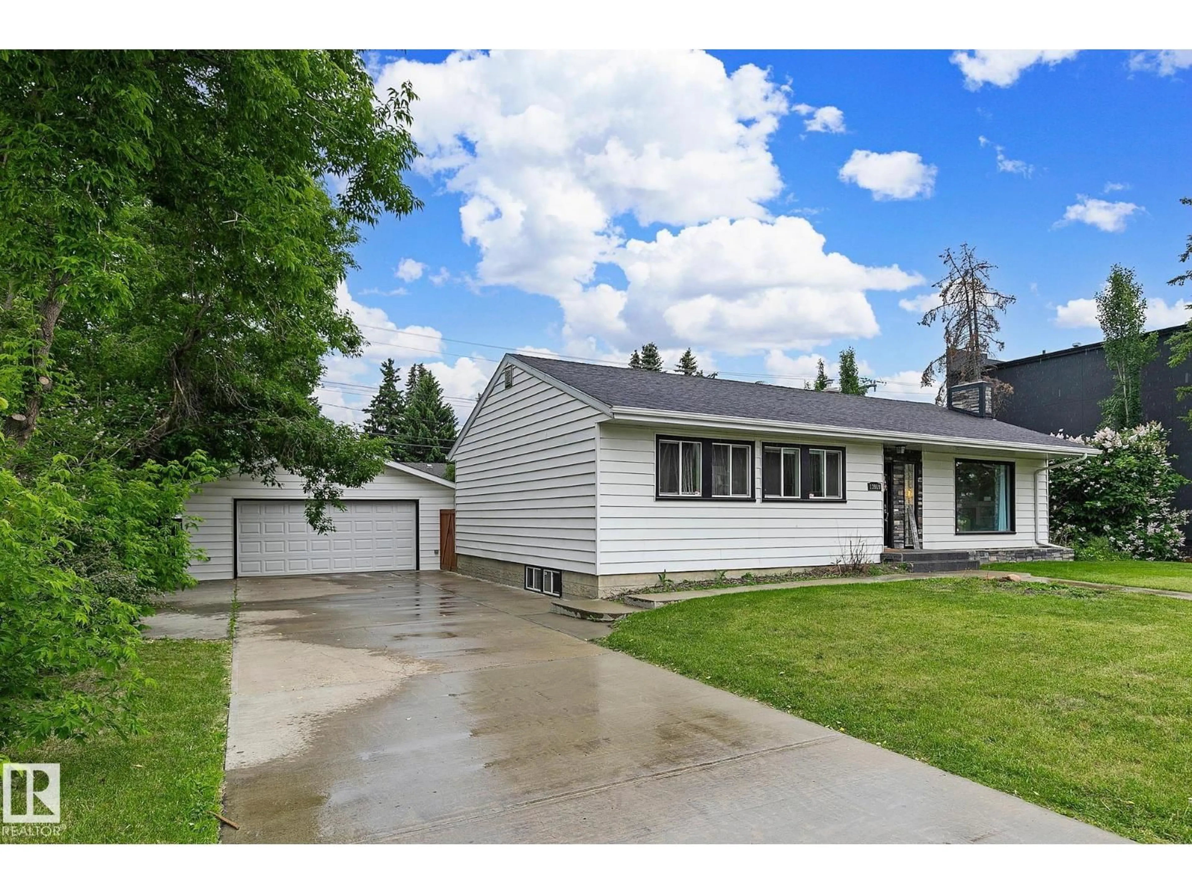 Home with vinyl exterior material, street for 13919 102 AV, Edmonton Alberta T5N0P5
