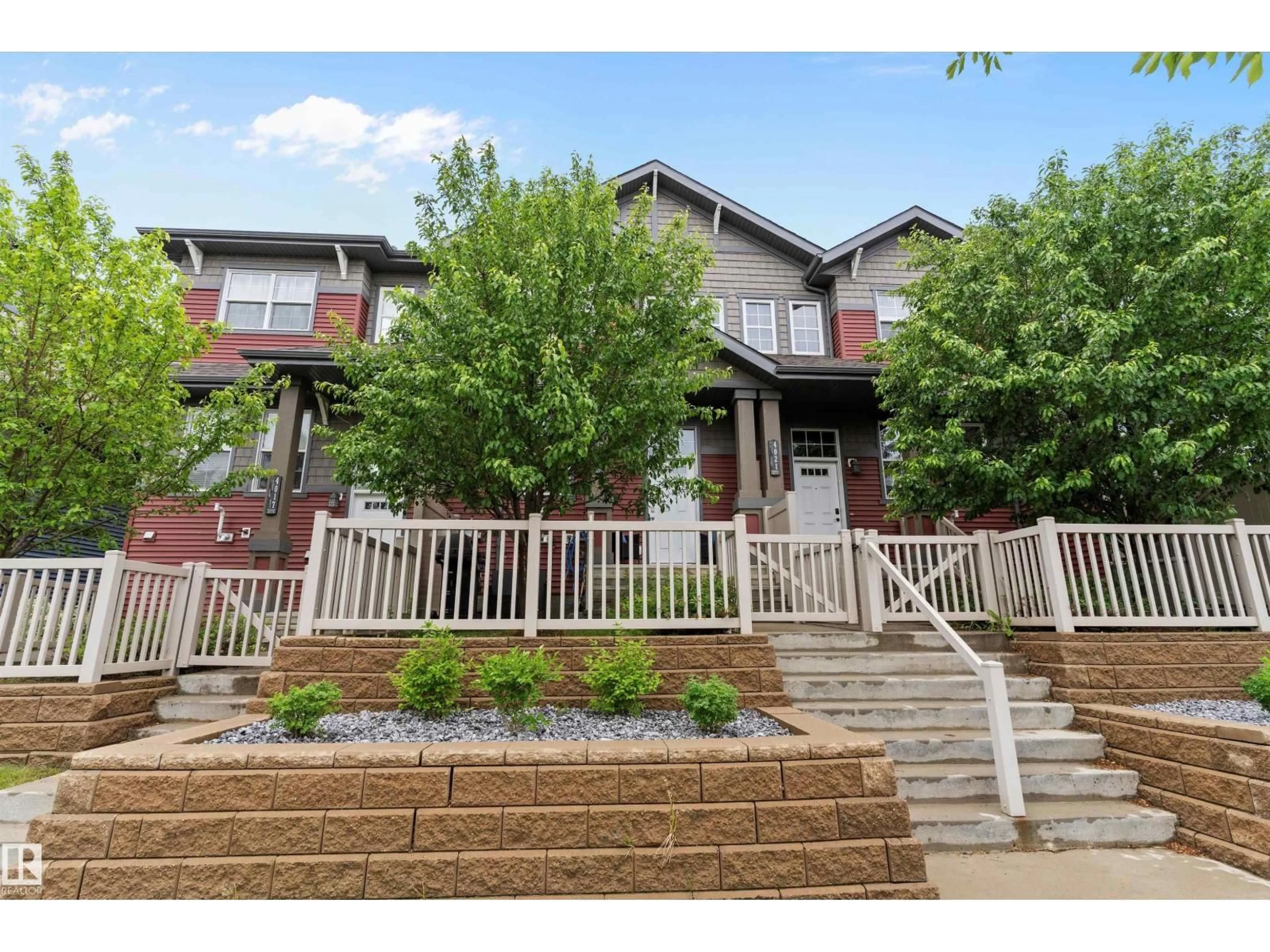 Home with brick exterior material, street for 4019 ORCHARDS DR, Edmonton Alberta T6C1V2