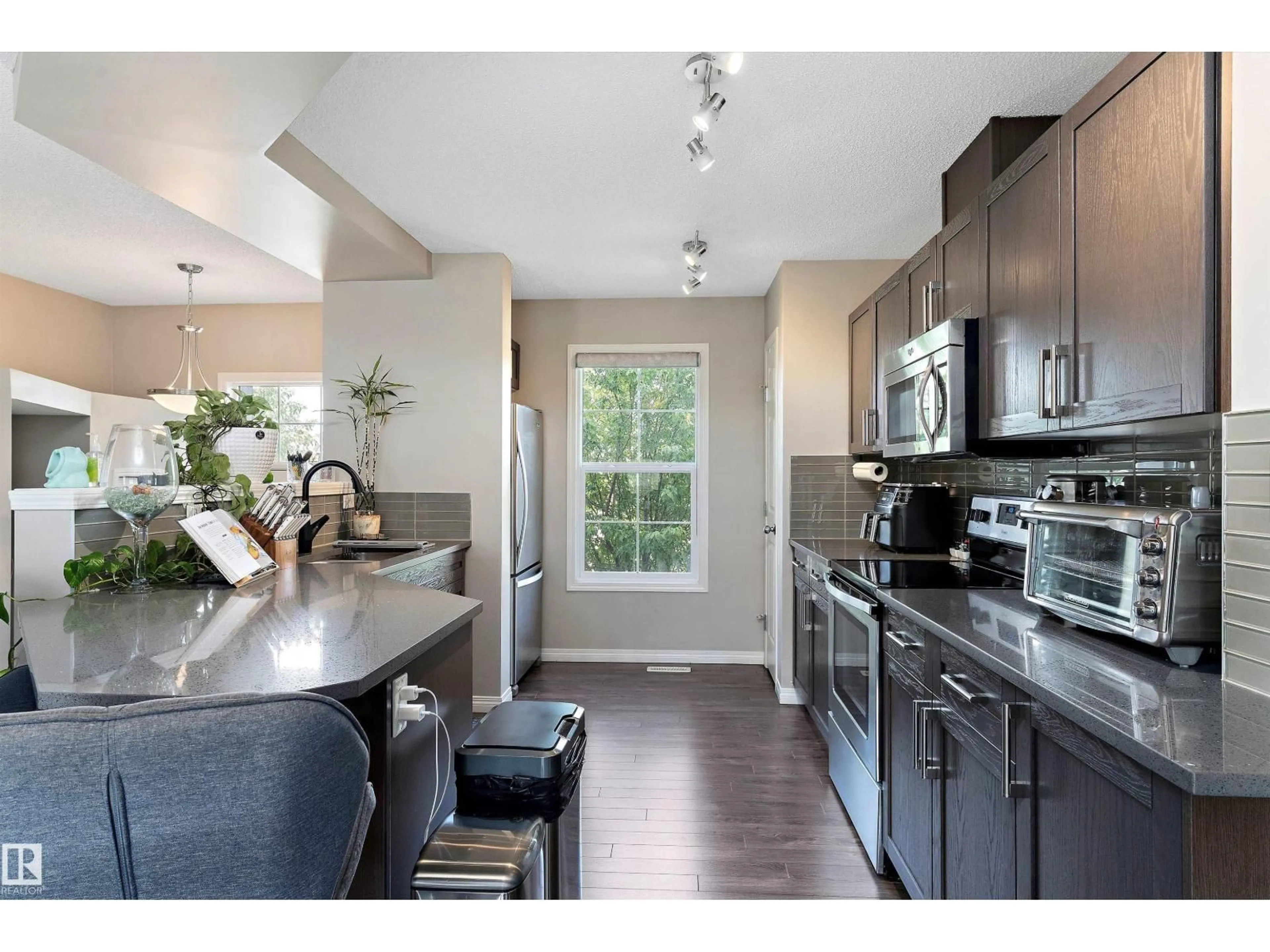 Open concept kitchen, unknown for 4019 ORCHARDS DR, Edmonton Alberta T6C1V2