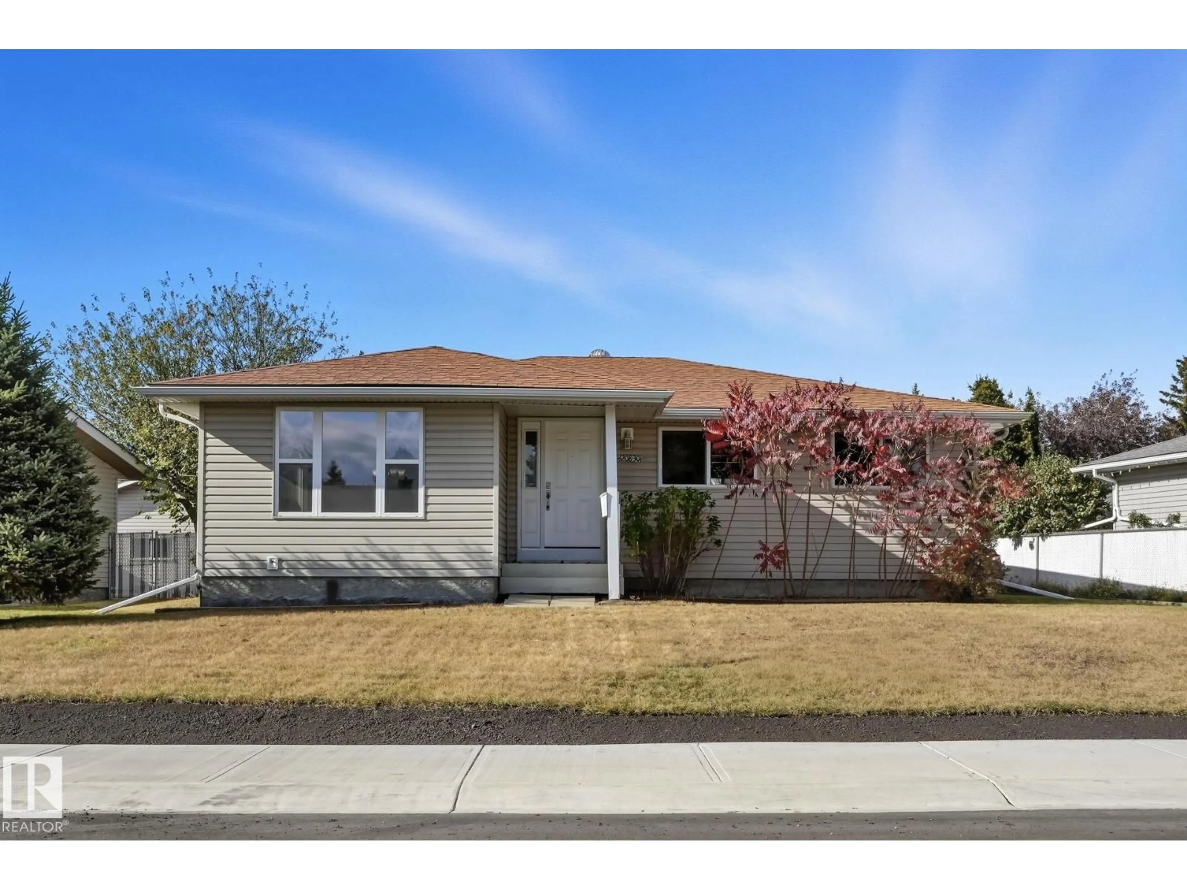 Home with vinyl exterior material, street for NW - 14208 30 ST, Edmonton Alberta T5W1M9