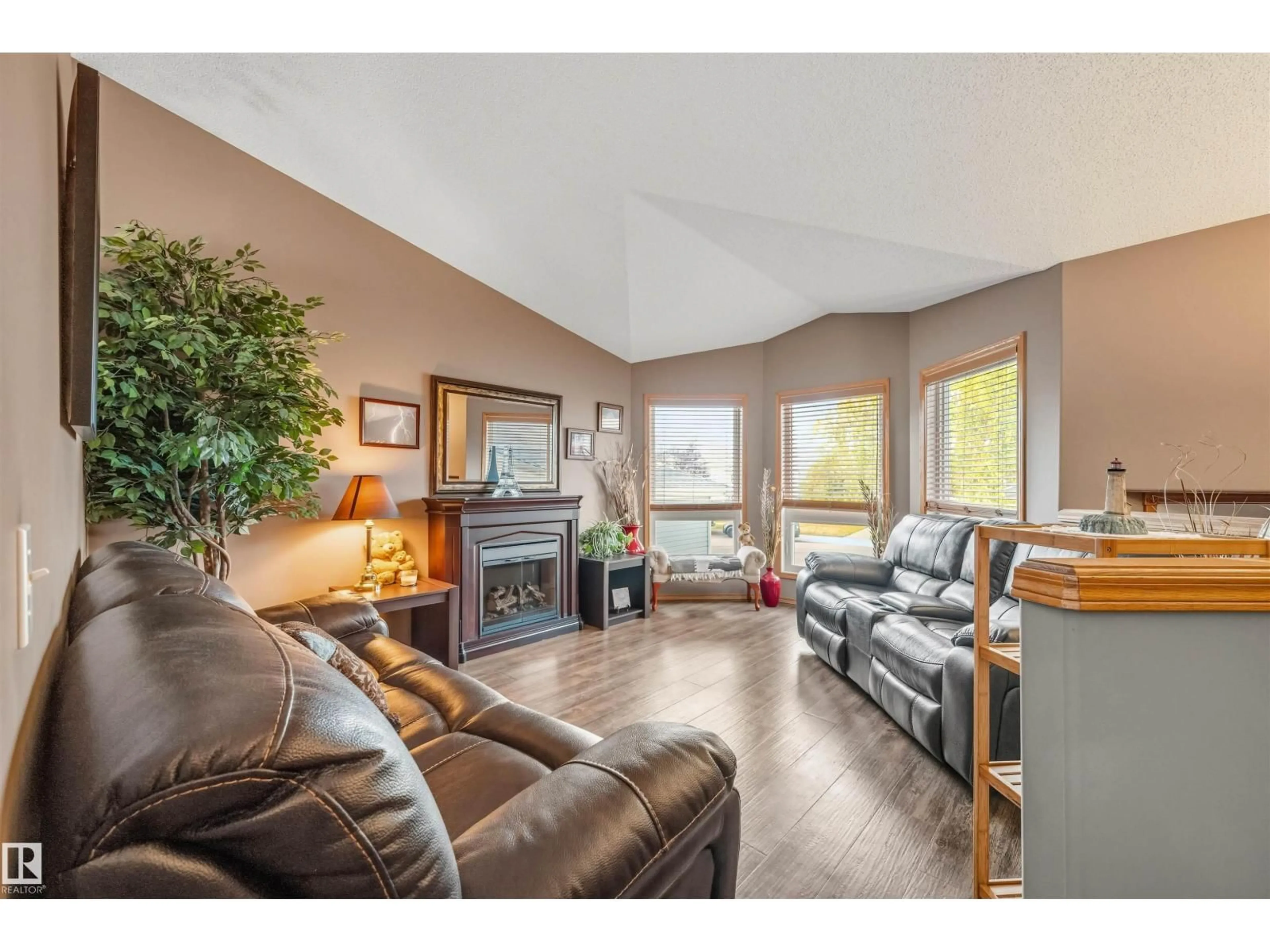 Living room with furniture, wood/laminate floor for 45 DORIAN WY, Sherwood Park Alberta T8H1Y6