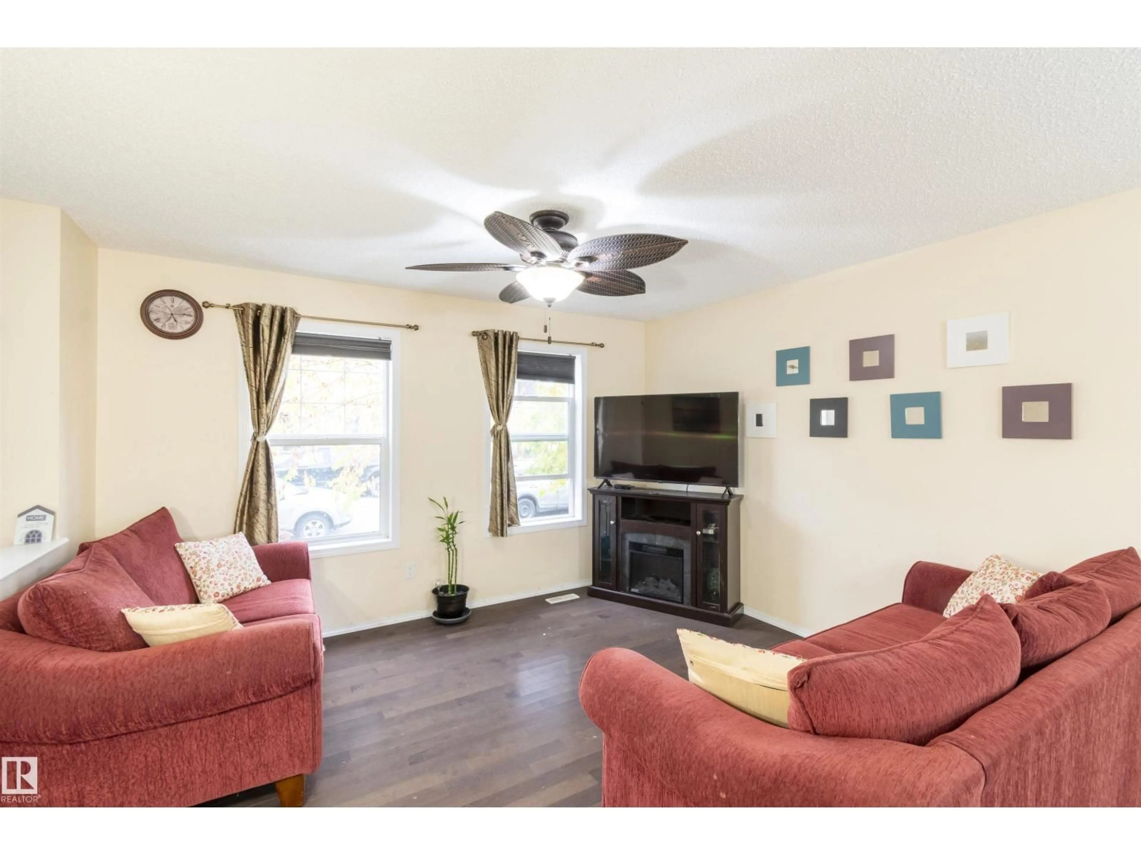 Living room with furniture, wood/laminate floor for SW - 3019 ARTHURS CR, Edmonton Alberta T6W2H9