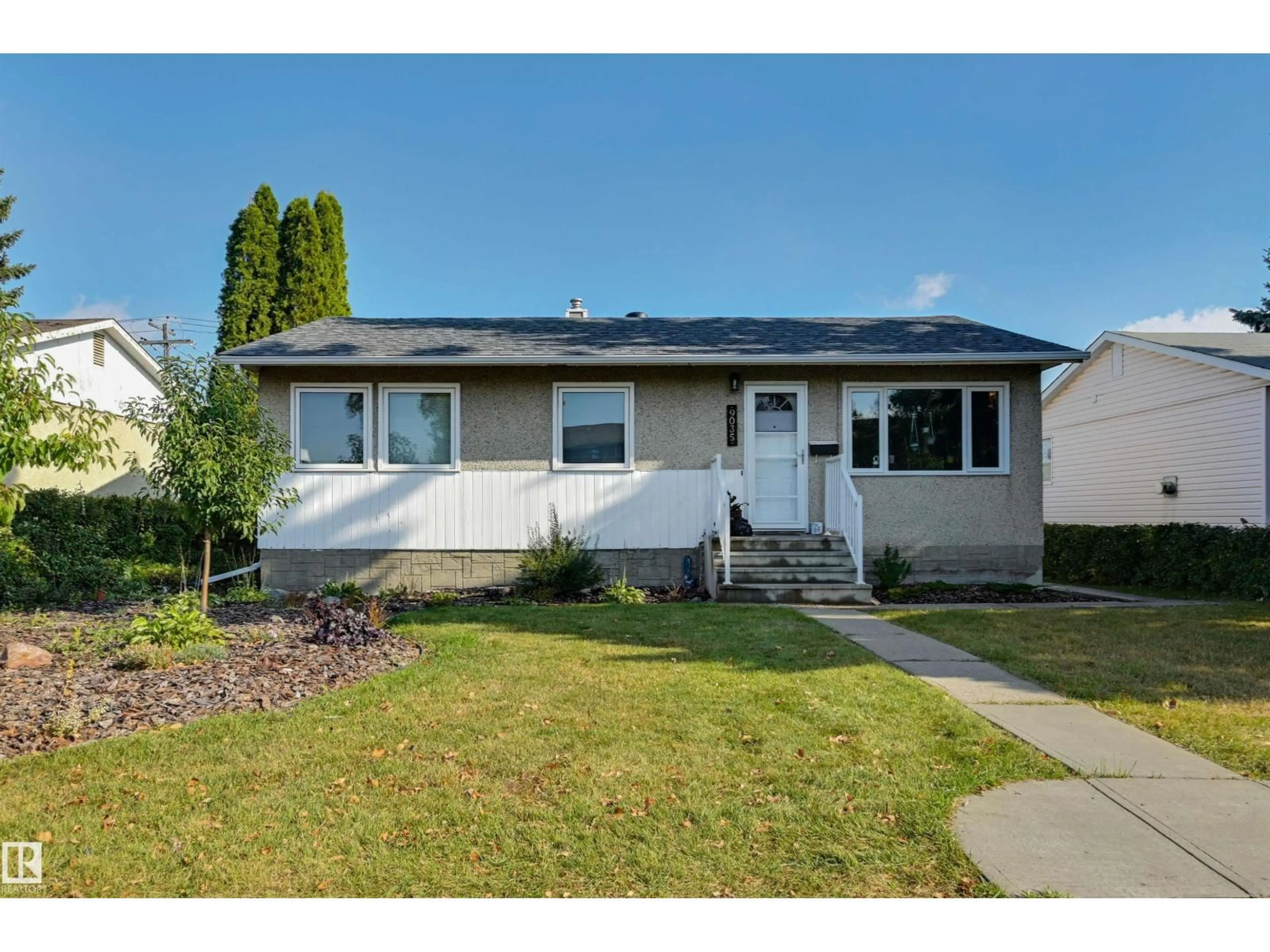 Home with vinyl exterior material, street for 9035 149 ST, Edmonton Alberta T5R0A5