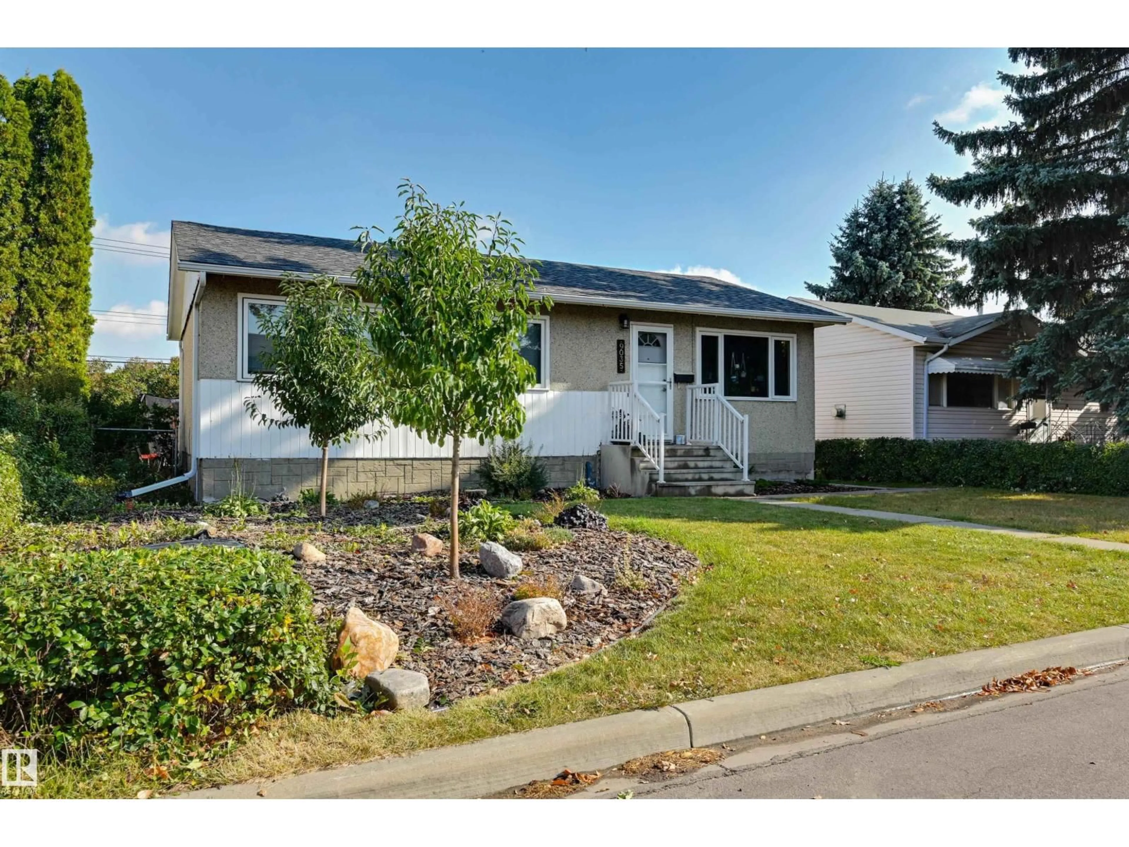 Home with vinyl exterior material, street for 9035 149 ST, Edmonton Alberta T5R0A5