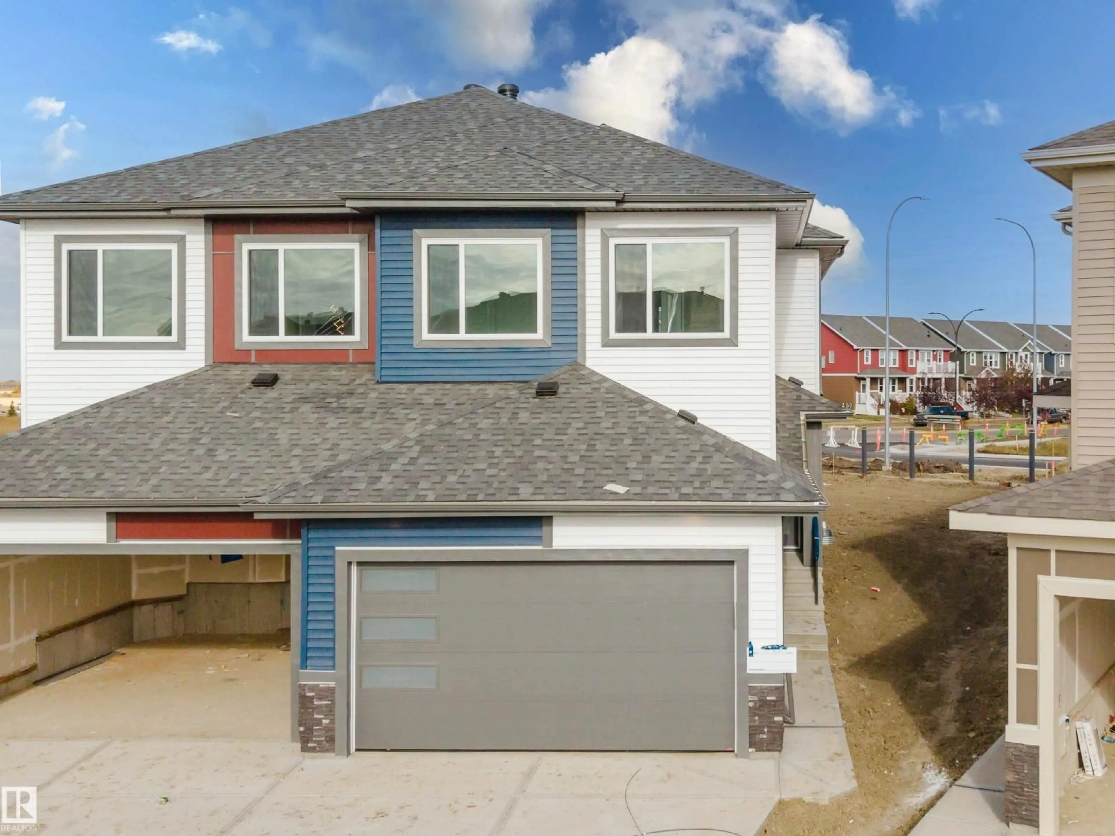 Home with vinyl exterior material, street for 130 MITCHELL BN, Leduc Alberta T9E1T5