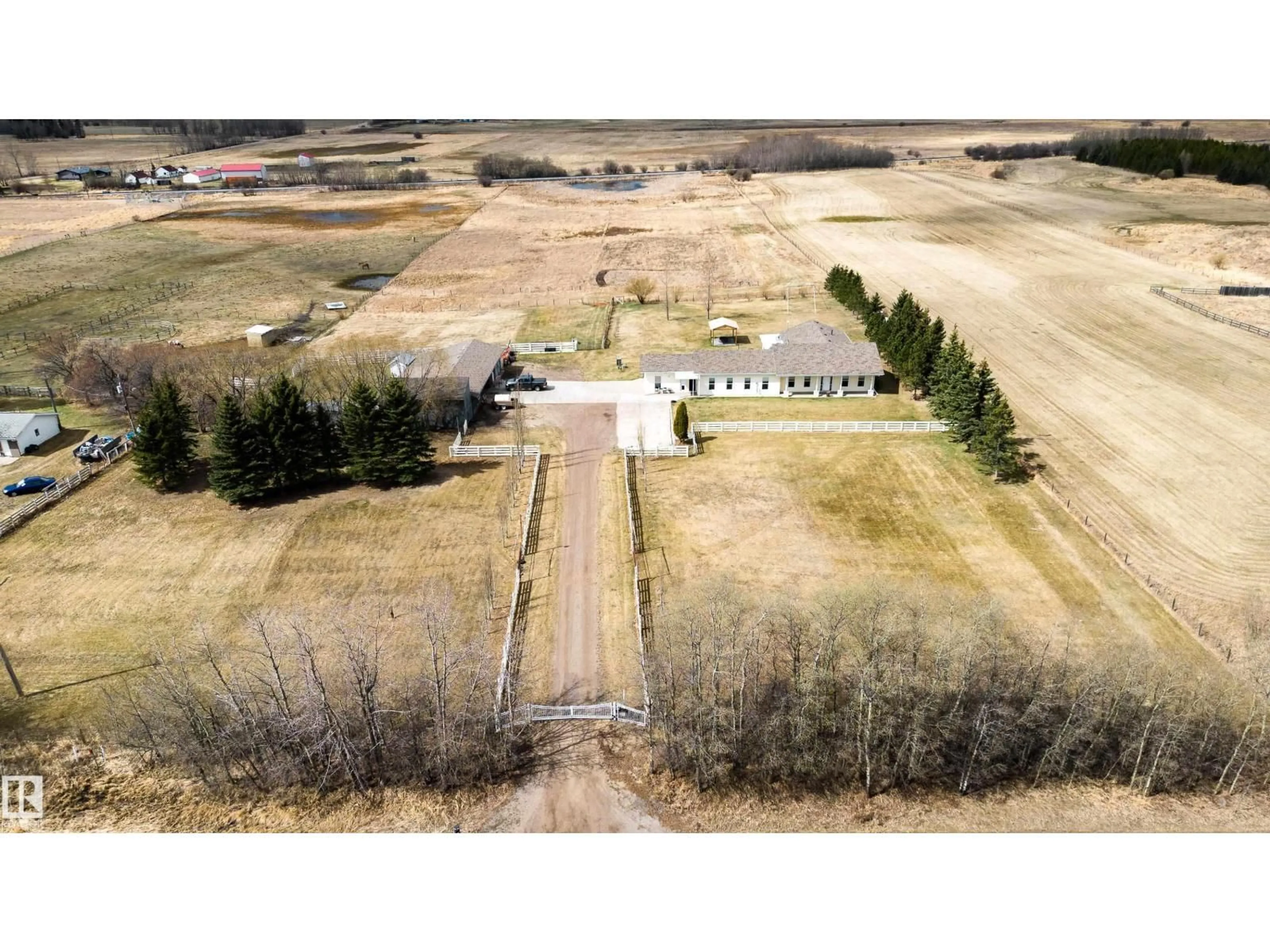 A pic from outside/outdoor area/front of a property/back of a property/a pic from drone, unknown for 51214 RGE RD 232, Rural Strathcona County Alberta T8B1K8