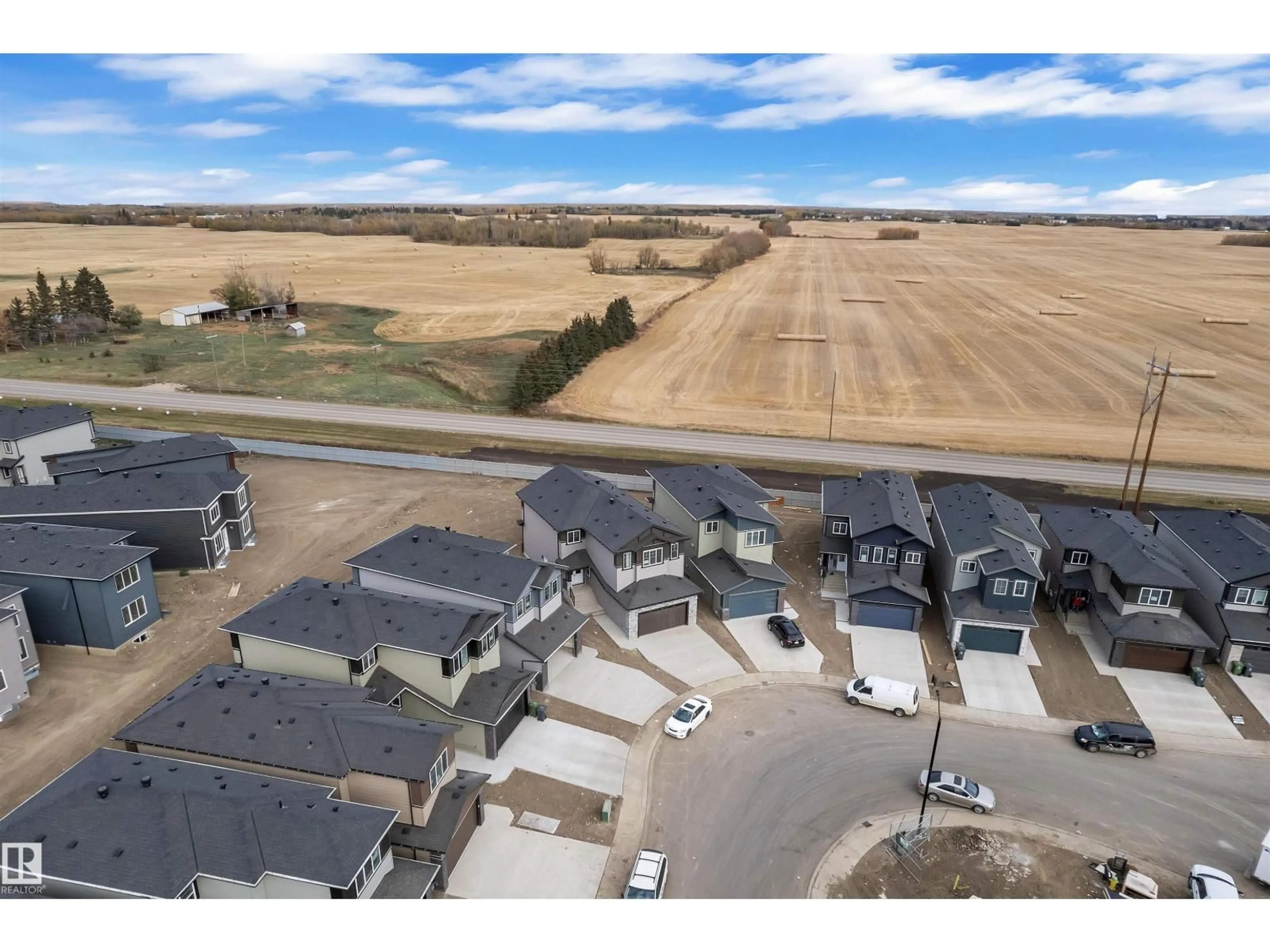 A pic from outside/outdoor area/front of a property/back of a property/a pic from drone, street for 3502 41 AV, Beaumont Alberta T4X3H3