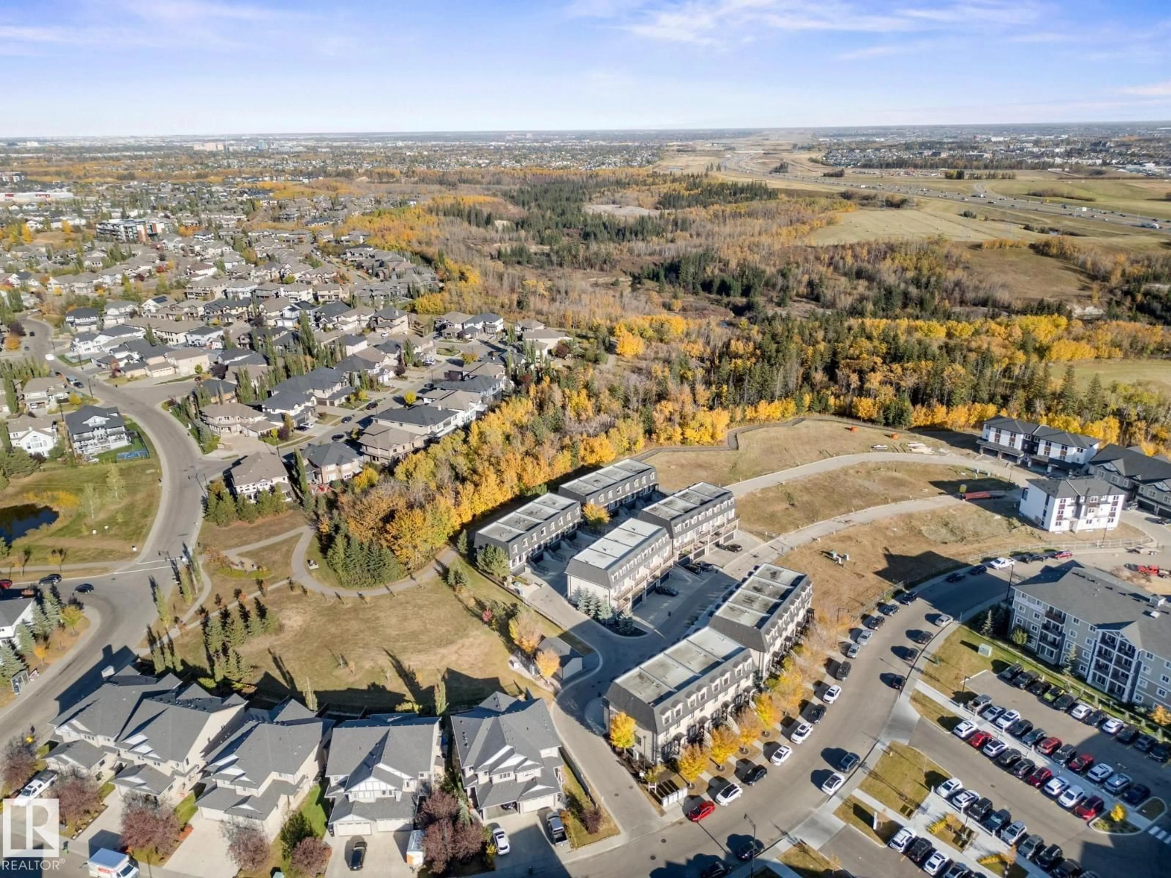A pic from outside/outdoor area/front of a property/back of a property/a pic from drone, mountain view for 19 - 5873 MULLEN PL, Edmonton Alberta T6R0T5