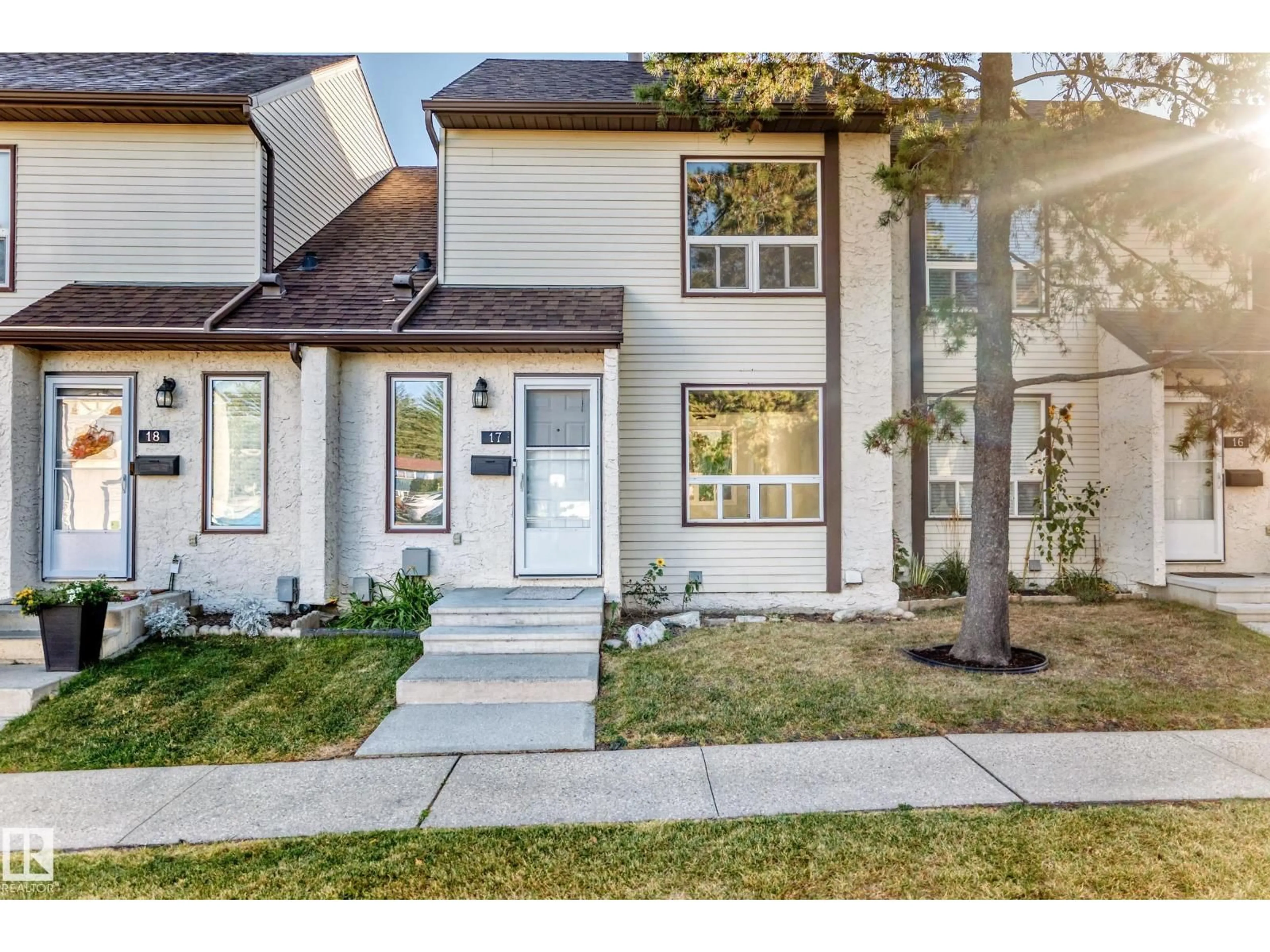 Home with vinyl exterior material, street for #17 - 1651 46 ST NW, Edmonton Alberta T6L5H2