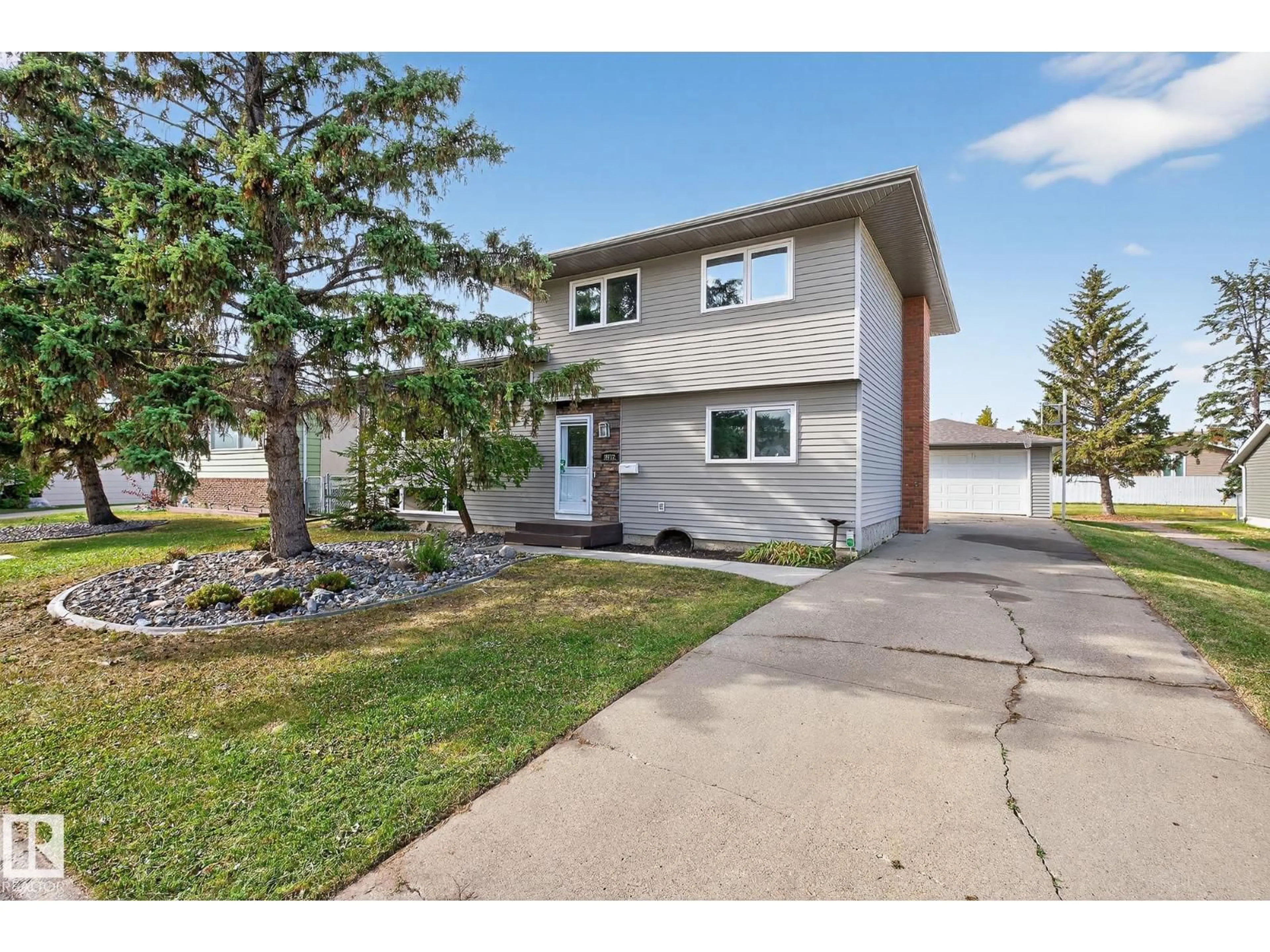 Home with vinyl exterior material, street for NW - 8012 172 ST, Edmonton Alberta T5T0C8
