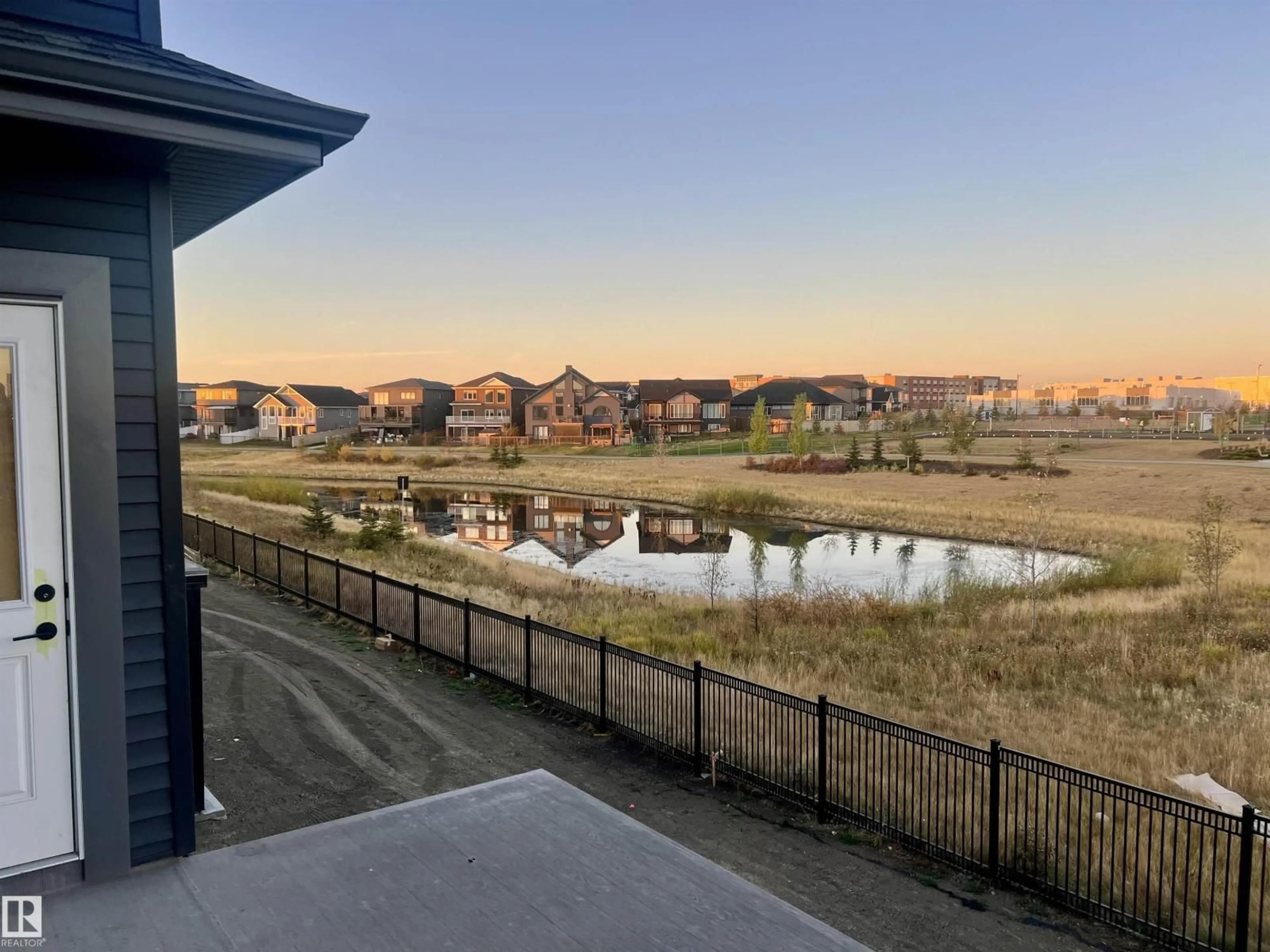 A pic from outside/outdoor area/front of a property/back of a property/a pic from drone, water/lake/river/ocean view for 48 ELDRIDGE PT, St. Albert Alberta T8N8C4