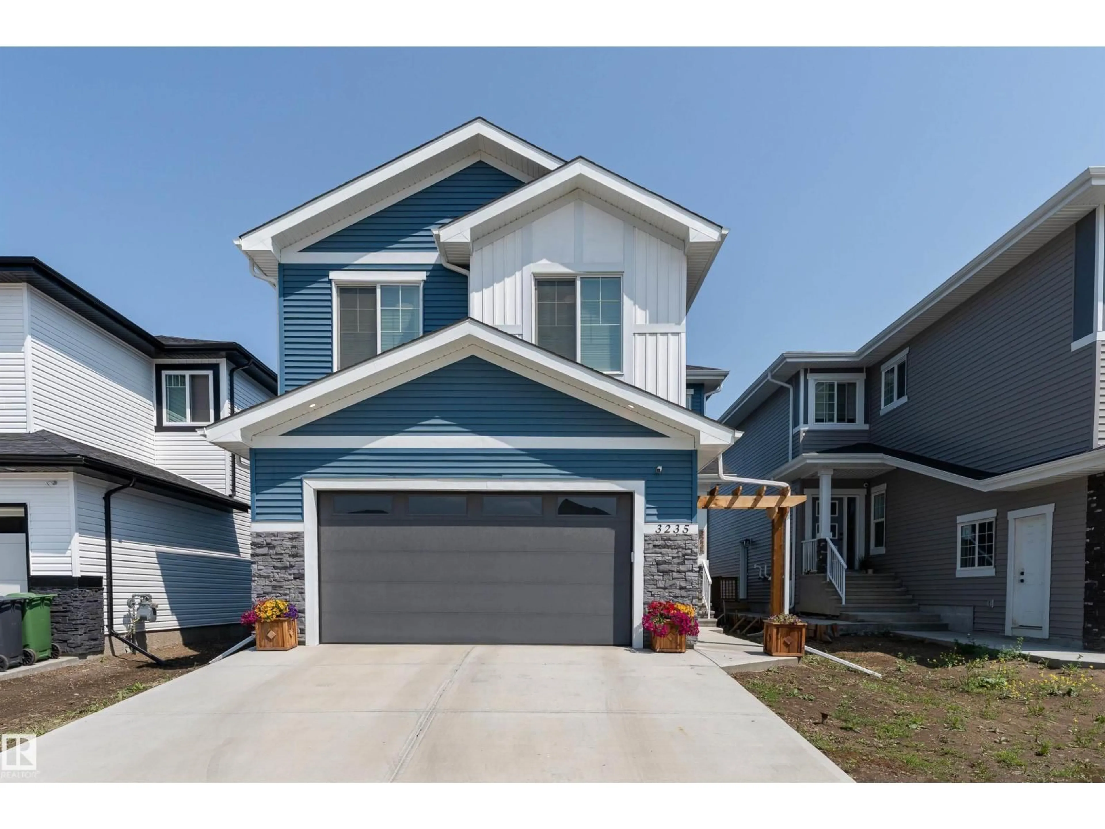 Home with vinyl exterior material, street for 3235 PELERIN CR, Beaumont Alberta T4X2Z1