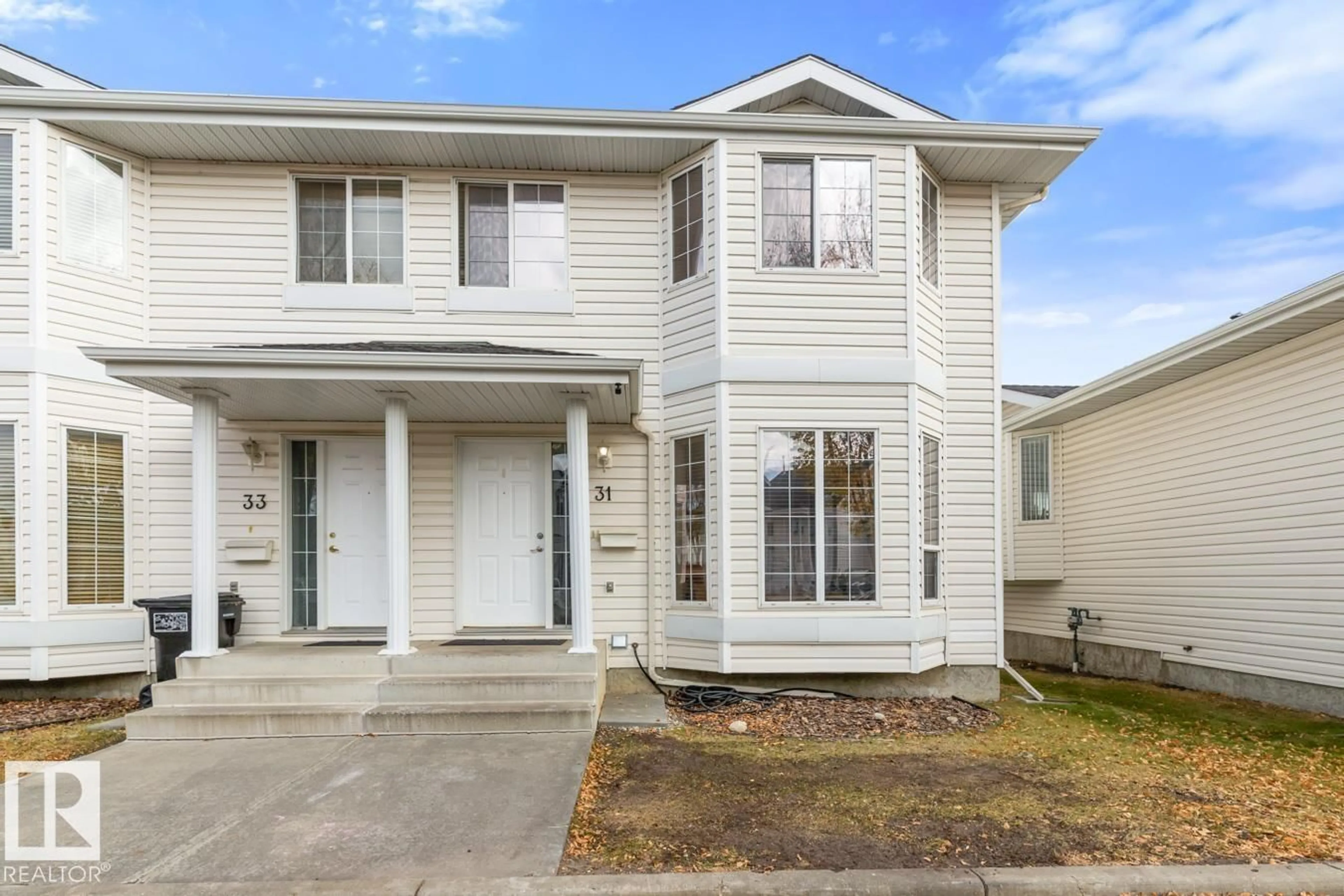 Home with vinyl exterior material, street for #31 - 3380 28A AV NW, Edmonton Alberta T6T1V4