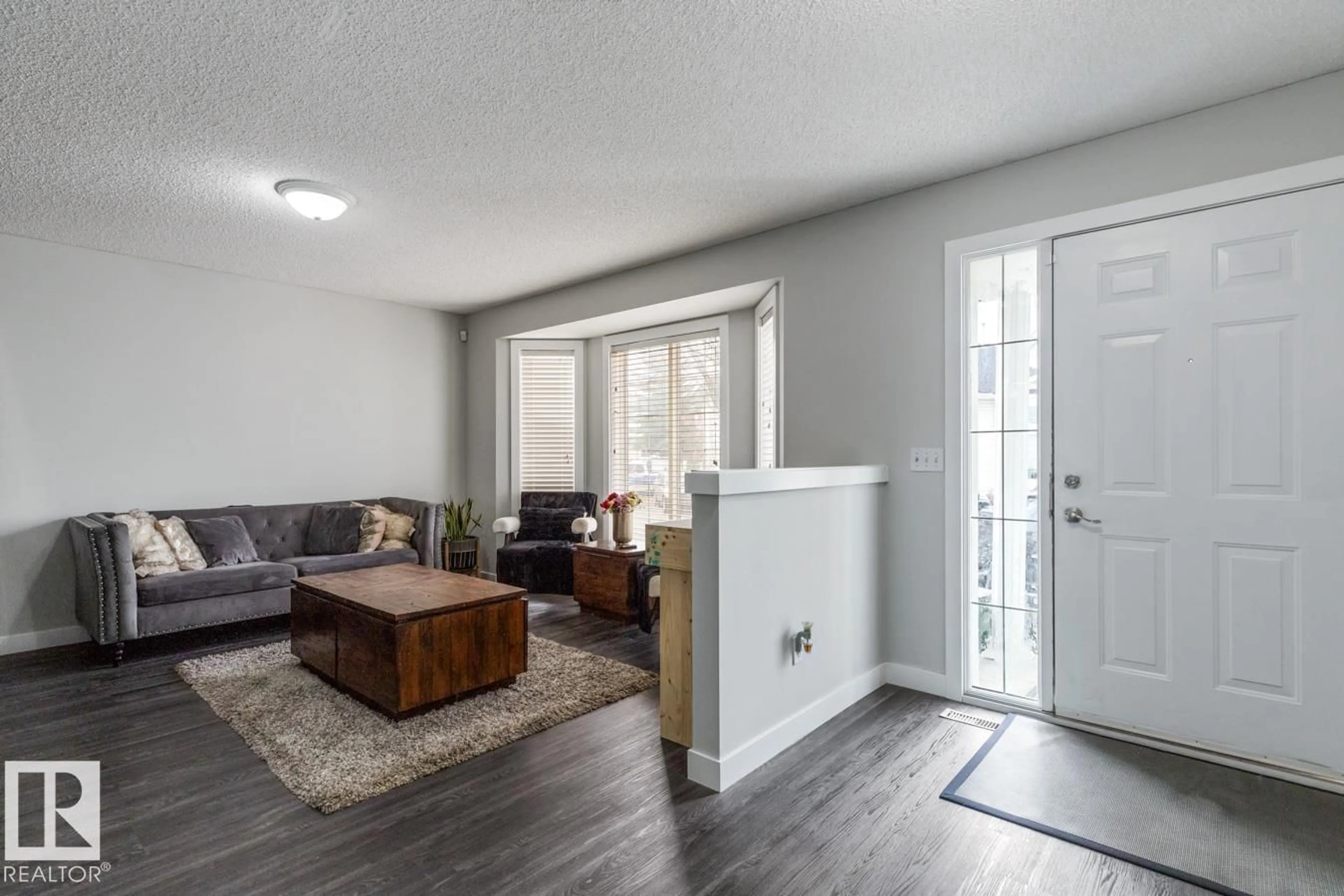 Living room with furniture, wood/laminate floor for #31 - 3380 28A AV NW, Edmonton Alberta T6T1V4