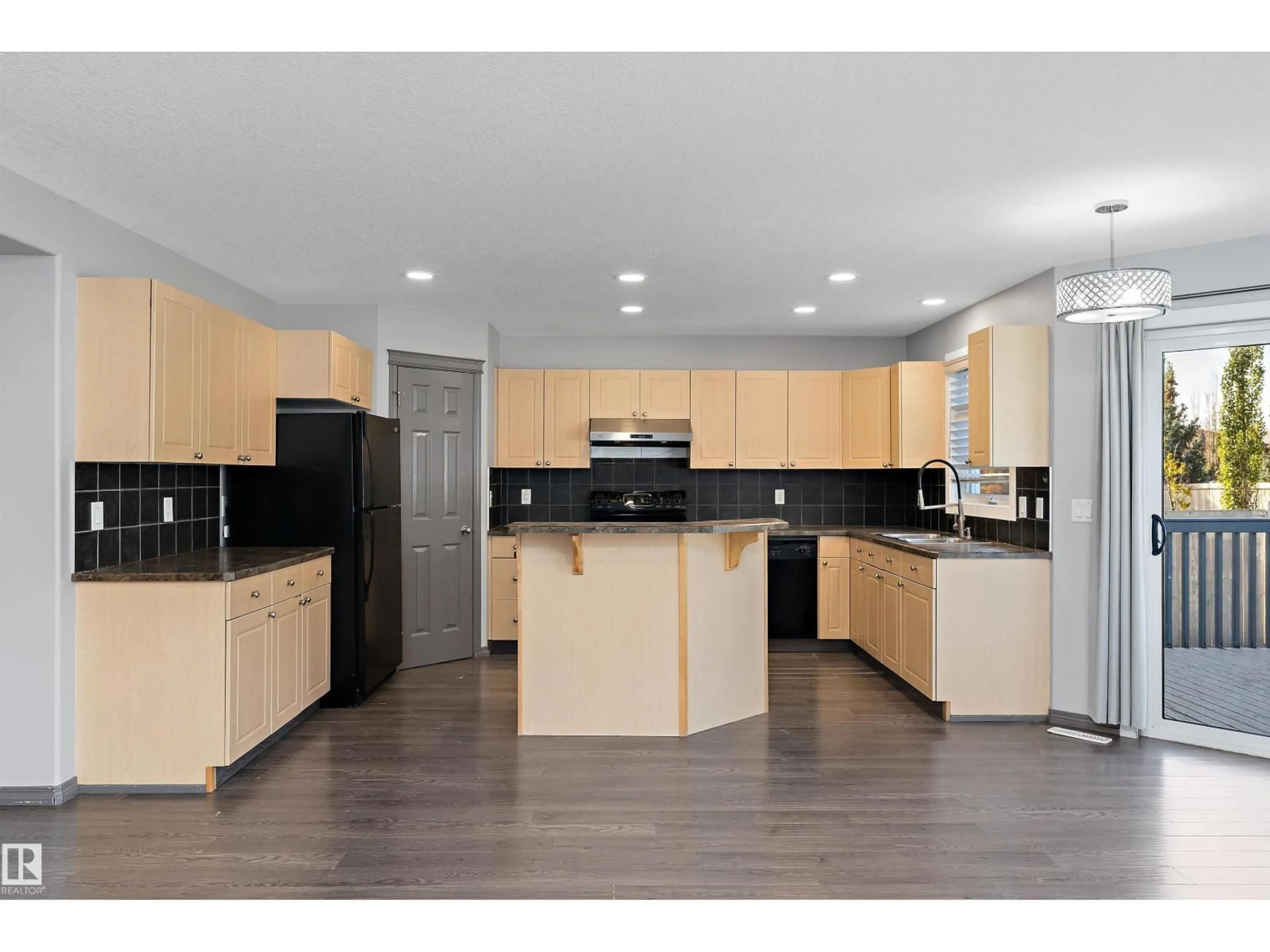 Open concept kitchen, unknown for 8736 178 AV, Edmonton Alberta T5Z0B8
