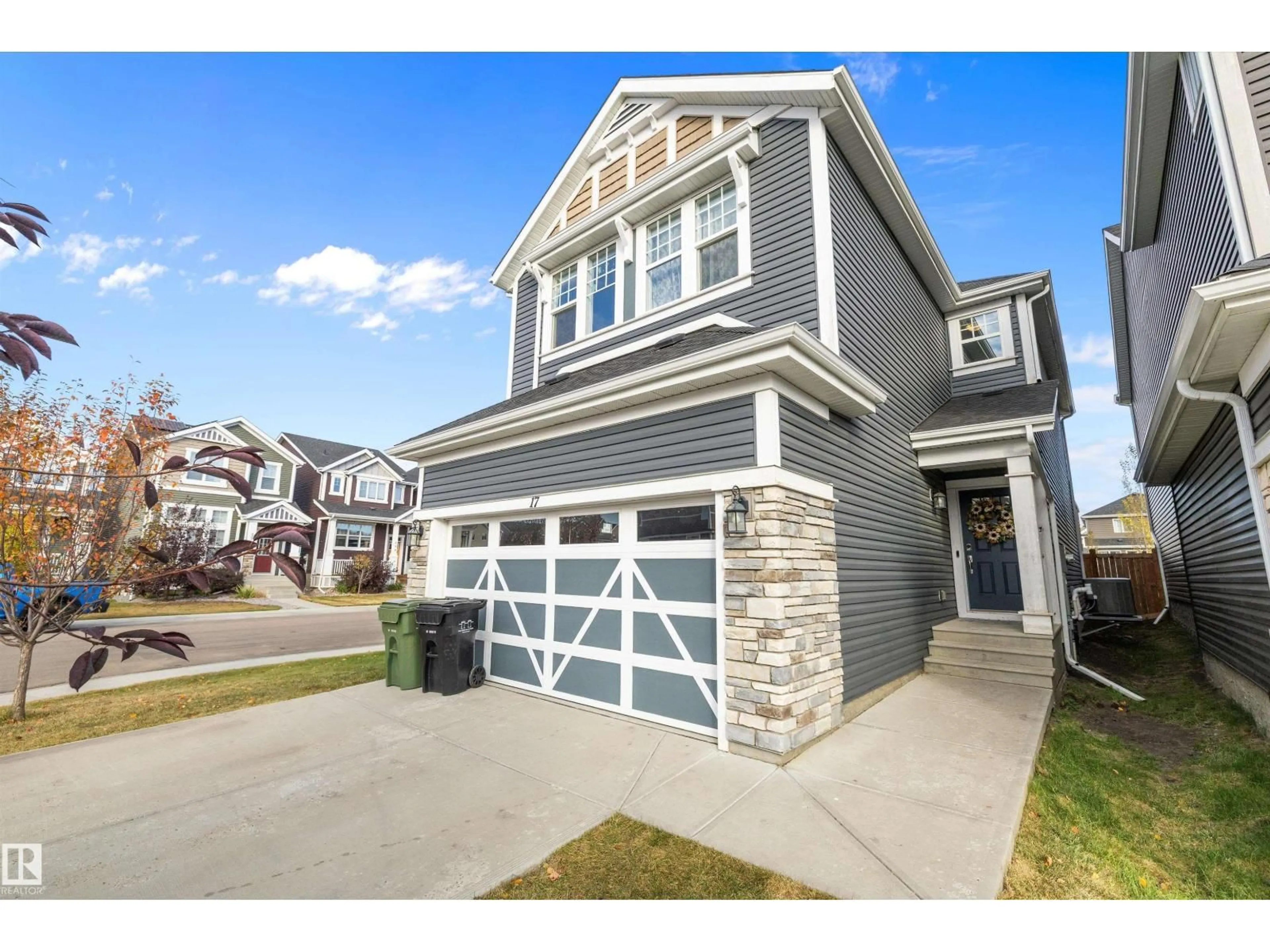 Home with vinyl exterior material, street for 17 STOUT PL, Leduc Alberta T9E1K4