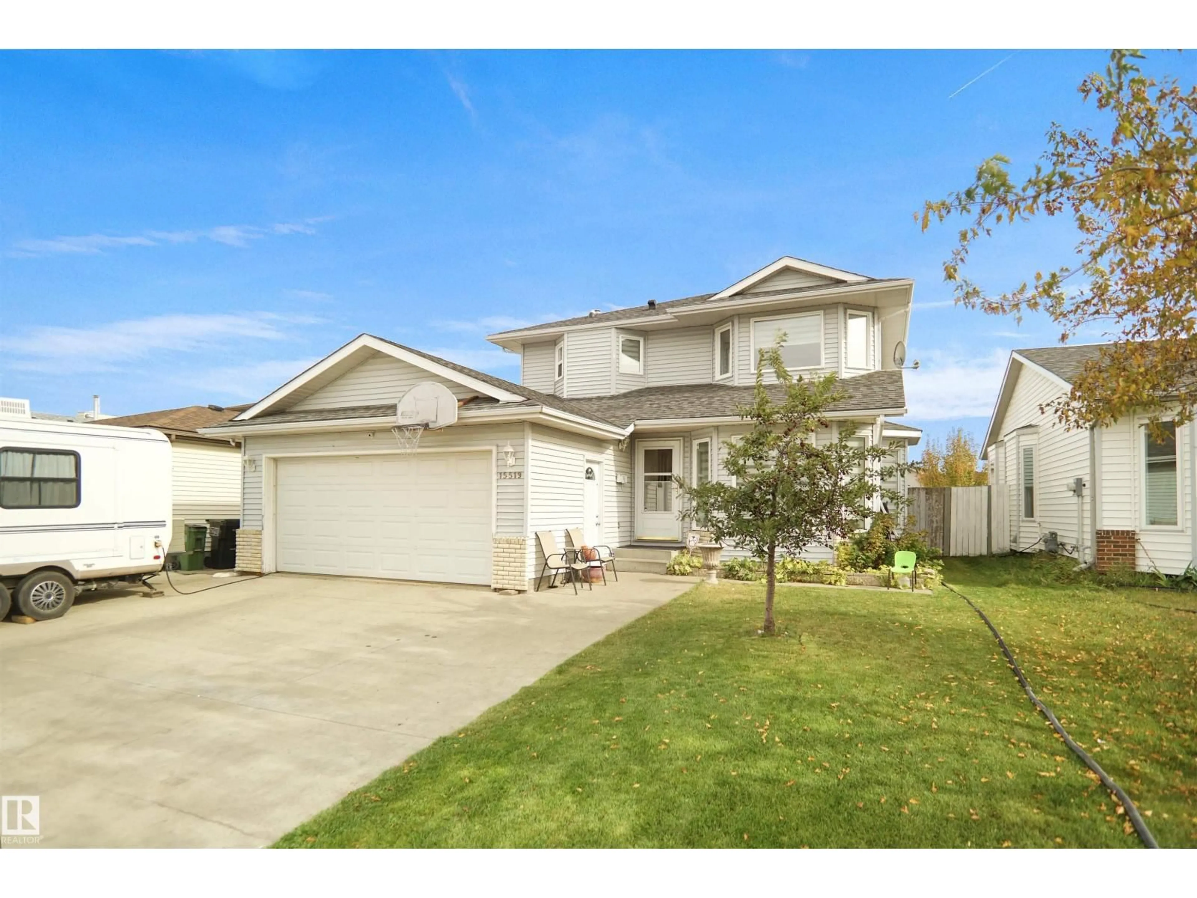 Home with vinyl exterior material, street for 15519 70 ST, Edmonton Alberta T5Z2Y6