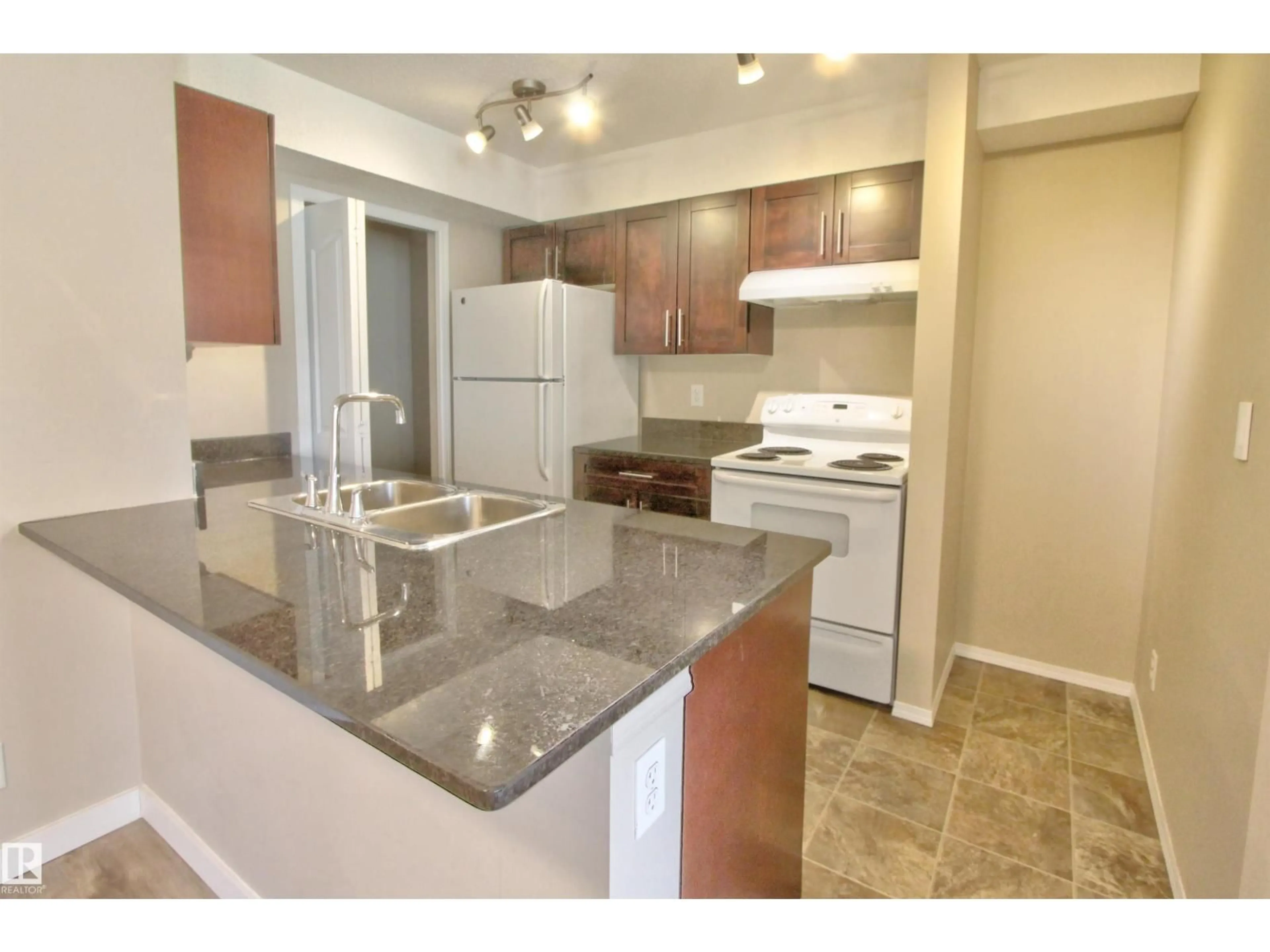 Standard kitchen, unknown for #106 - 530 WATT BV, Edmonton Alberta T6X1P7