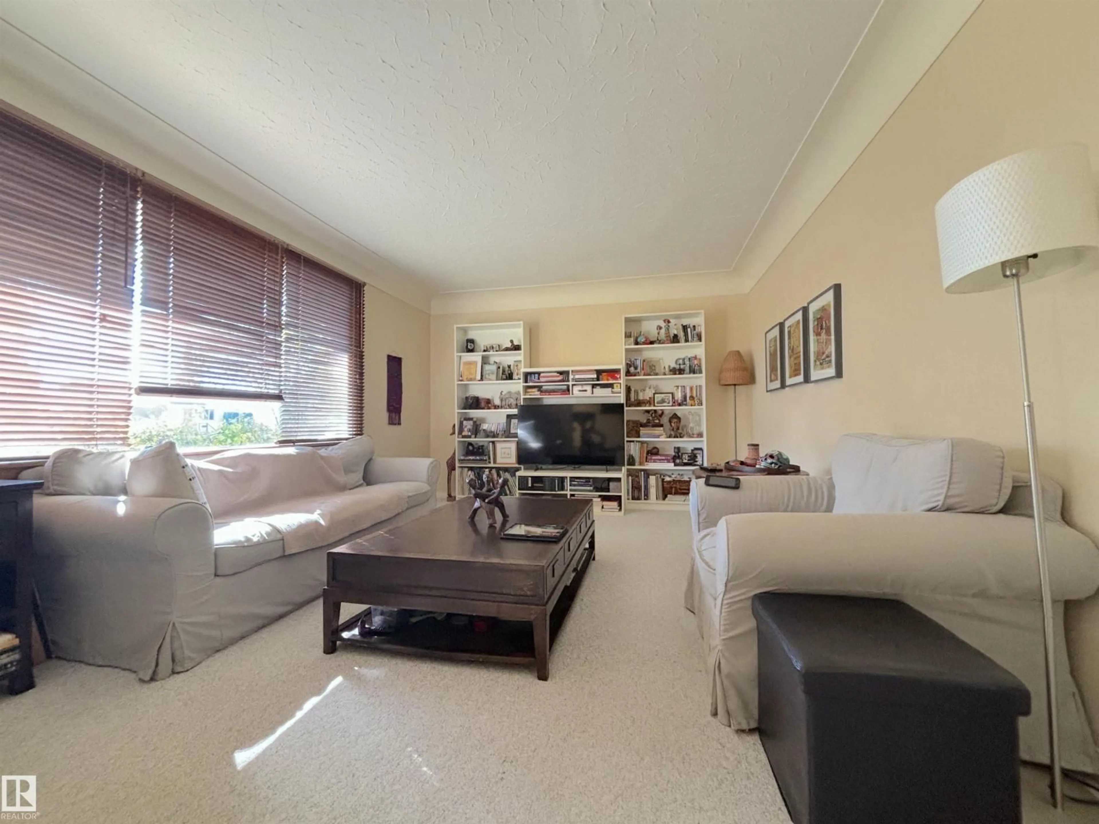 Living room with furniture, unknown for 8516 64 AV, Edmonton Alberta T6E0M7