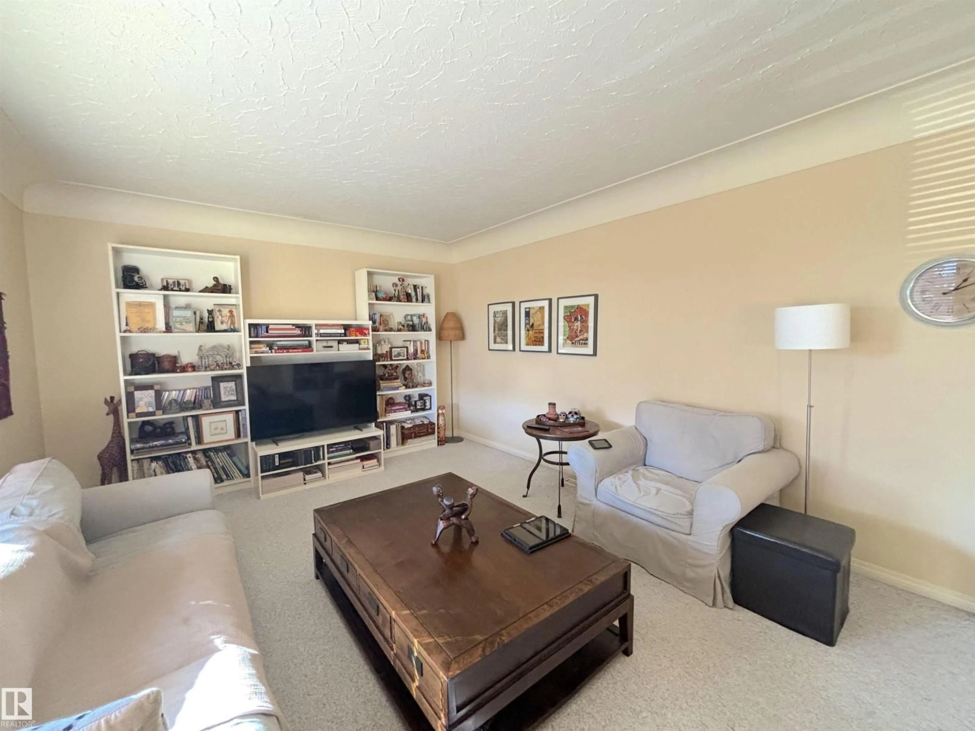 Living room with furniture, unknown for 8516 64 AV, Edmonton Alberta T6E0M7