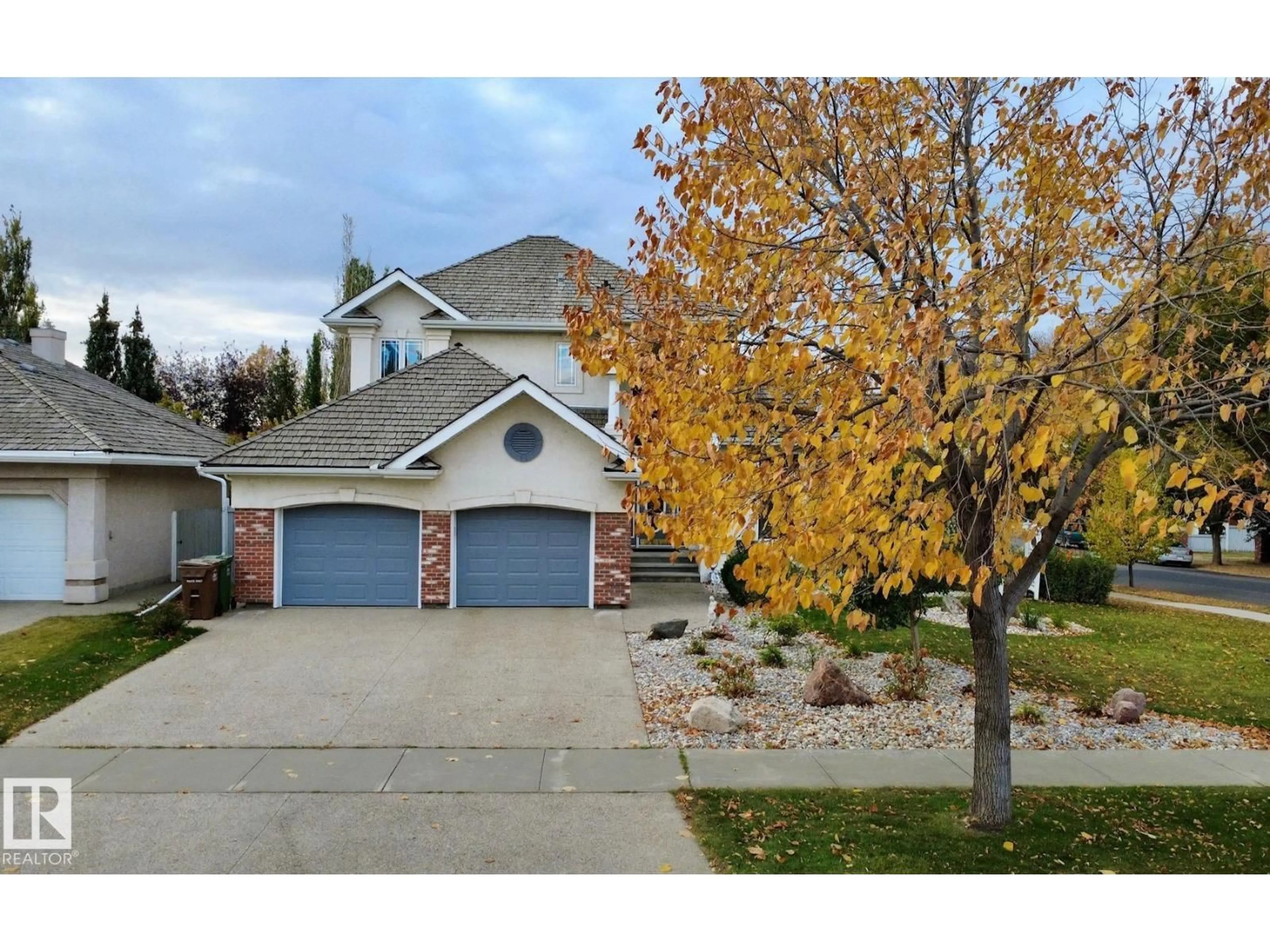 Home with vinyl exterior material, street for 1 KELSO CT, St. Albert Alberta T8N6W5