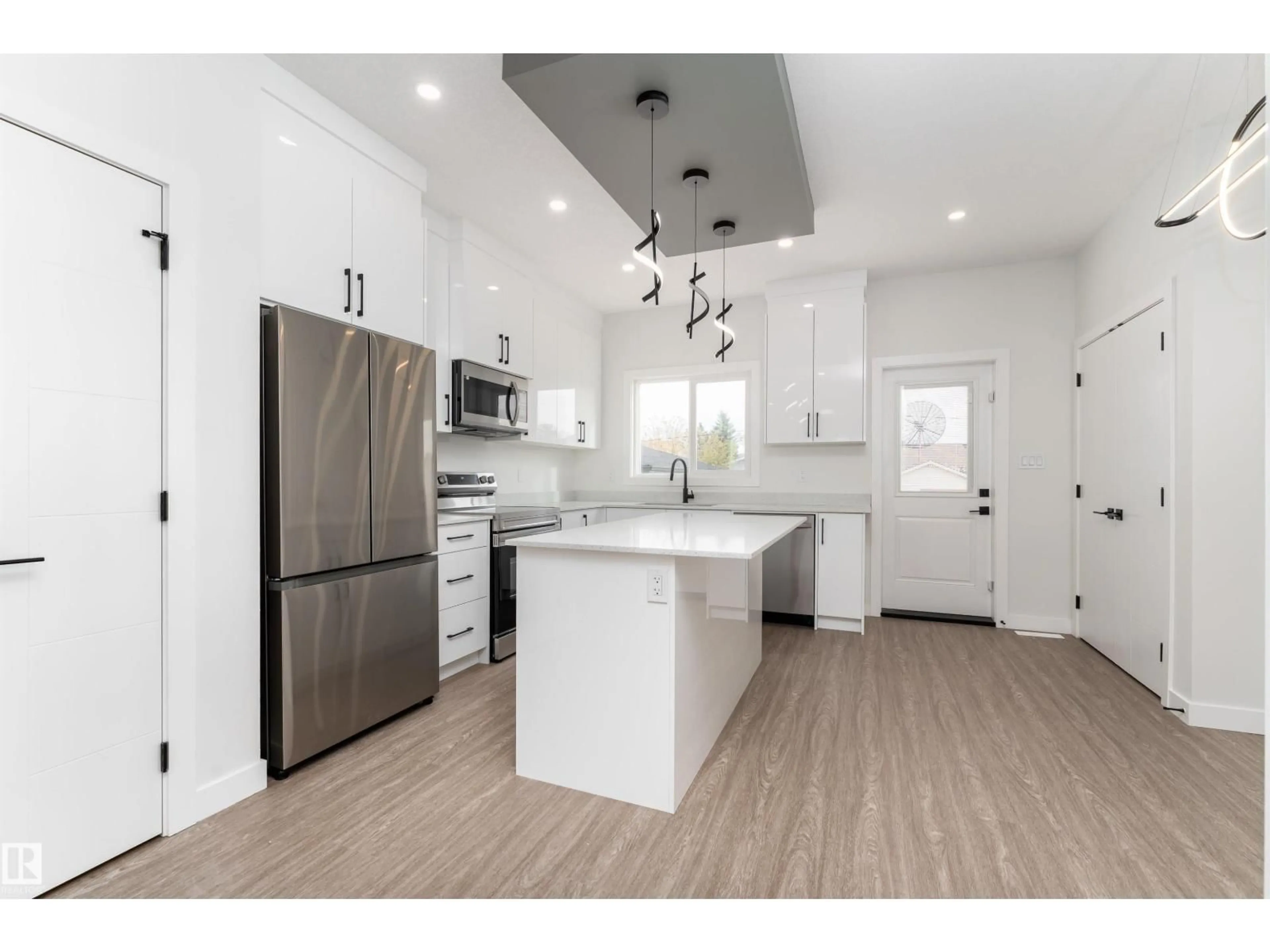 Open concept kitchen, unknown for 12431 47 ST, Edmonton Alberta T5W5E5