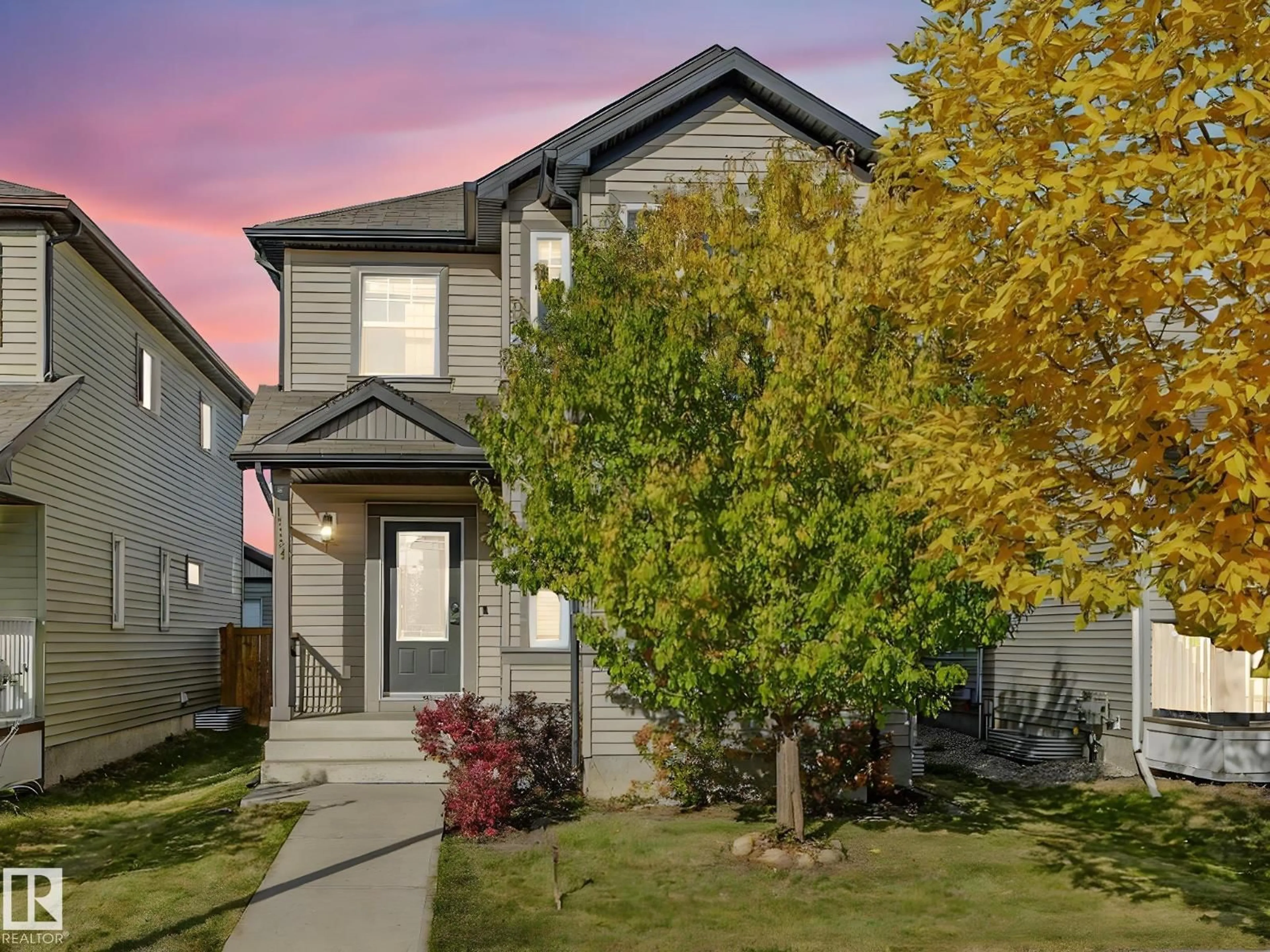 Home with vinyl exterior material, street for 17724 6 AV, Edmonton Alberta T6W2G6