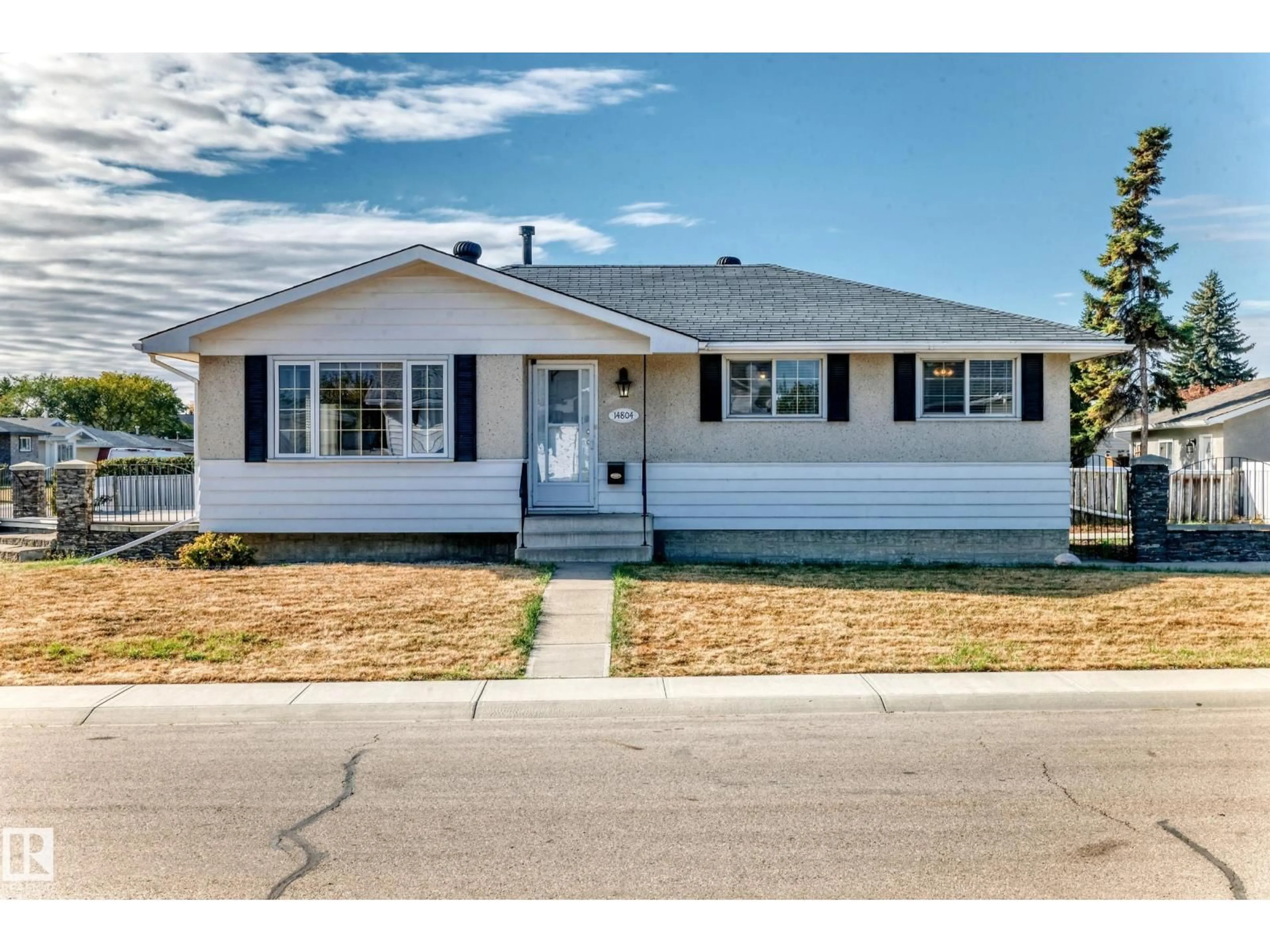 Home with vinyl exterior material, street for 14804 73A ST NW, Edmonton Alberta T5C0W4