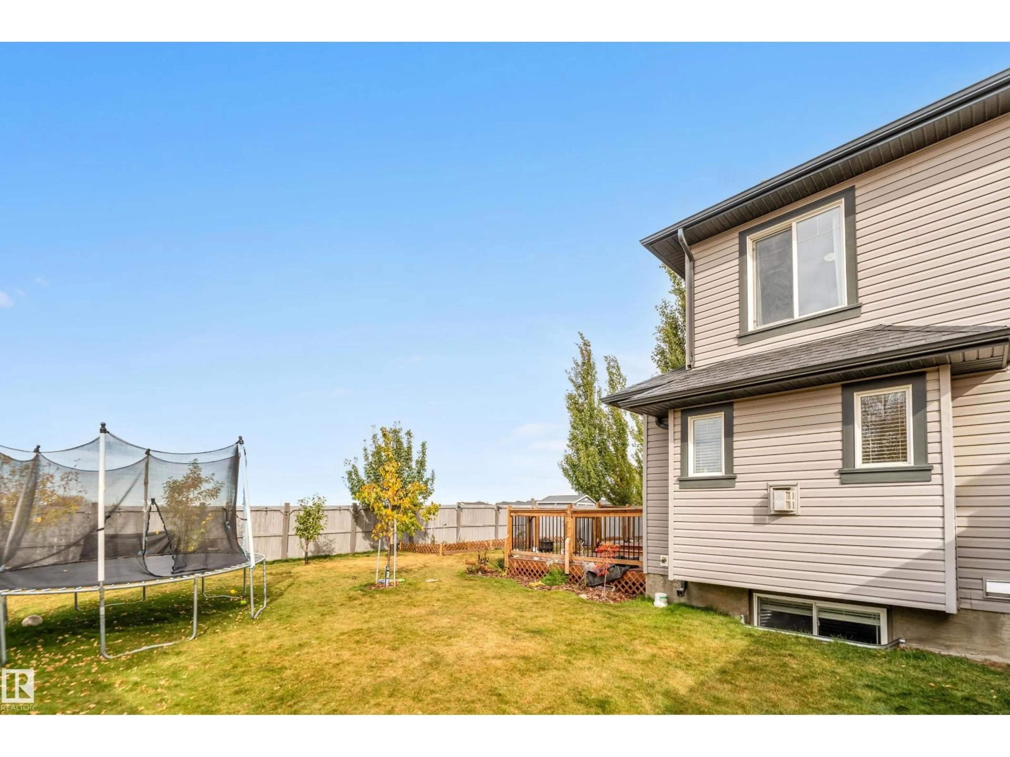 A pic from outside/outdoor area/front of a property/back of a property/a pic from drone, water/lake/river/ocean view for 118 RUE MONTALET, Beaumont Alberta T4X0W3