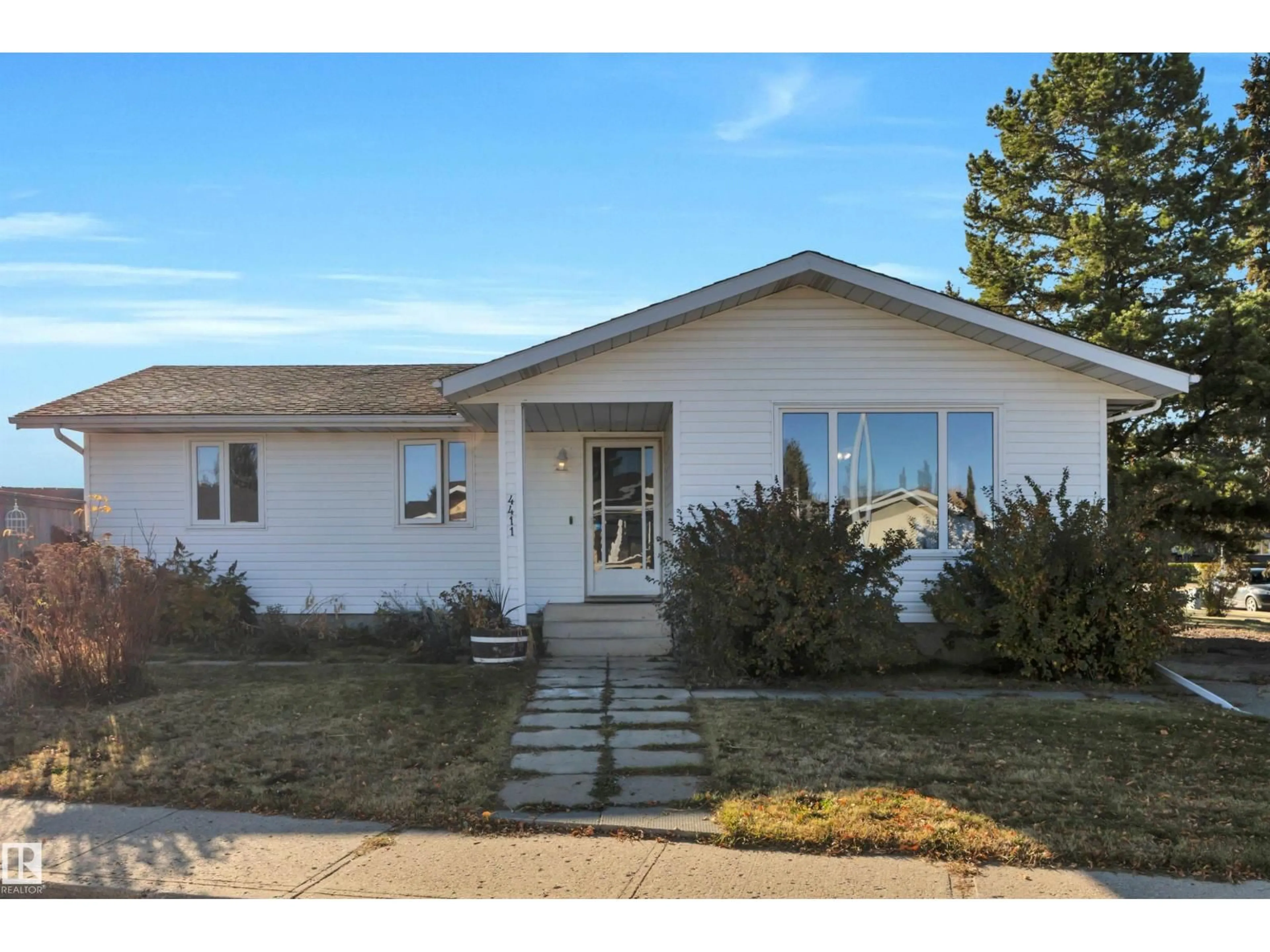Home with vinyl exterior material, street for 4411 42B AV, Leduc Alberta T9E4R2
