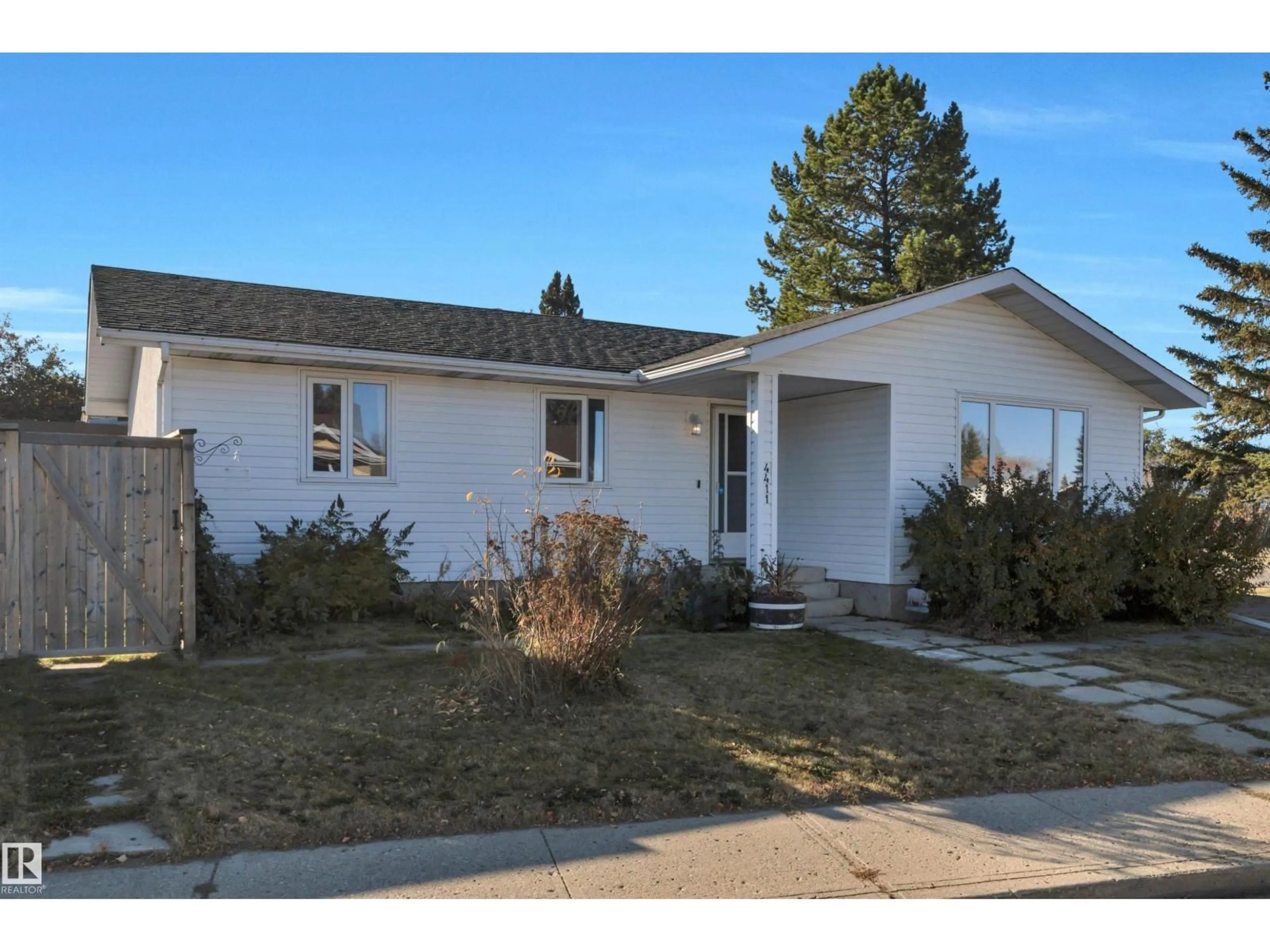 Home with vinyl exterior material, street for 4411 42B AV, Leduc Alberta T9E4R2