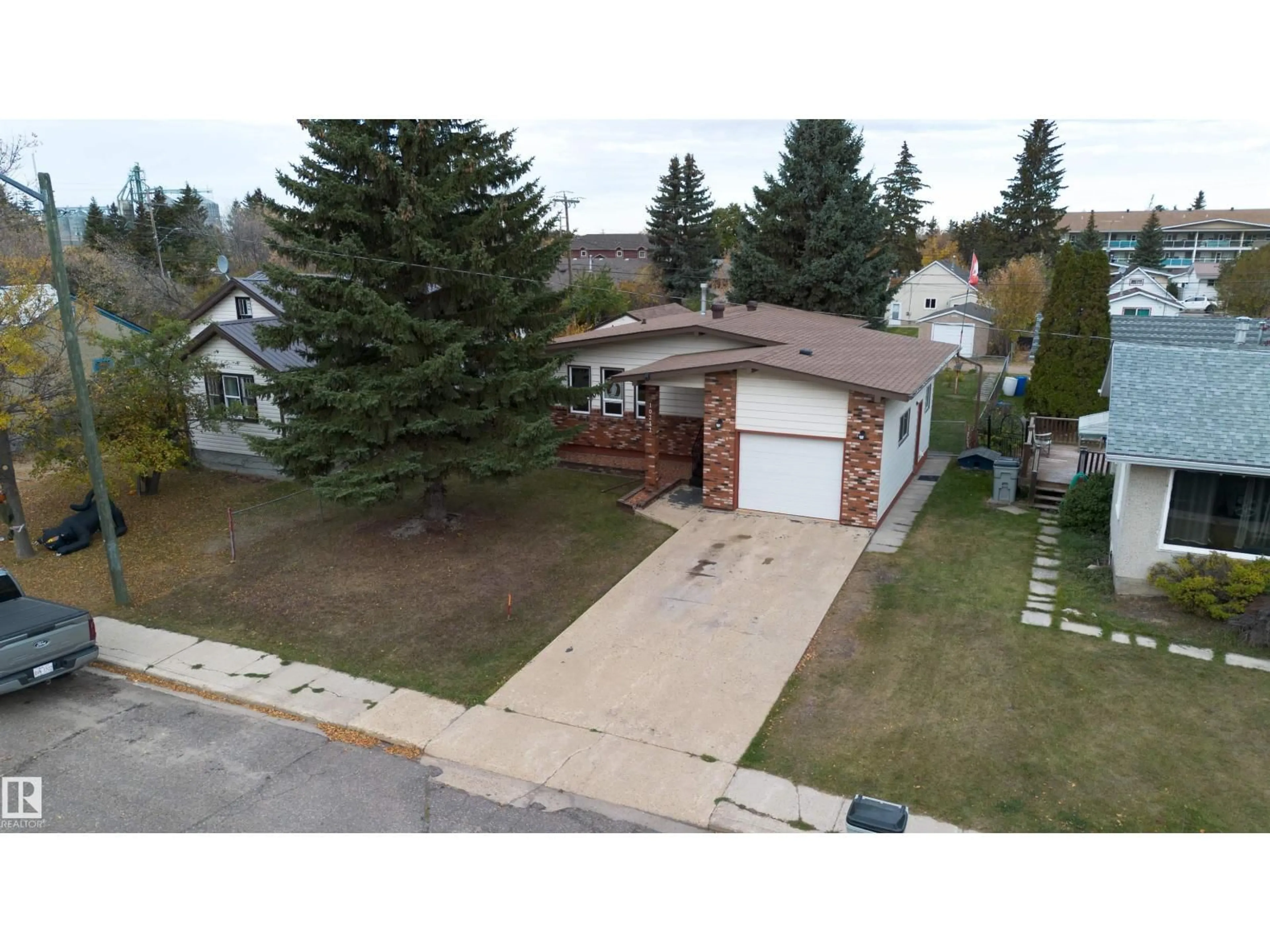 A pic from outside/outdoor area/front of a property/back of a property/a pic from drone, street for 10212 105 ST, Westlock Alberta T7P1W1
