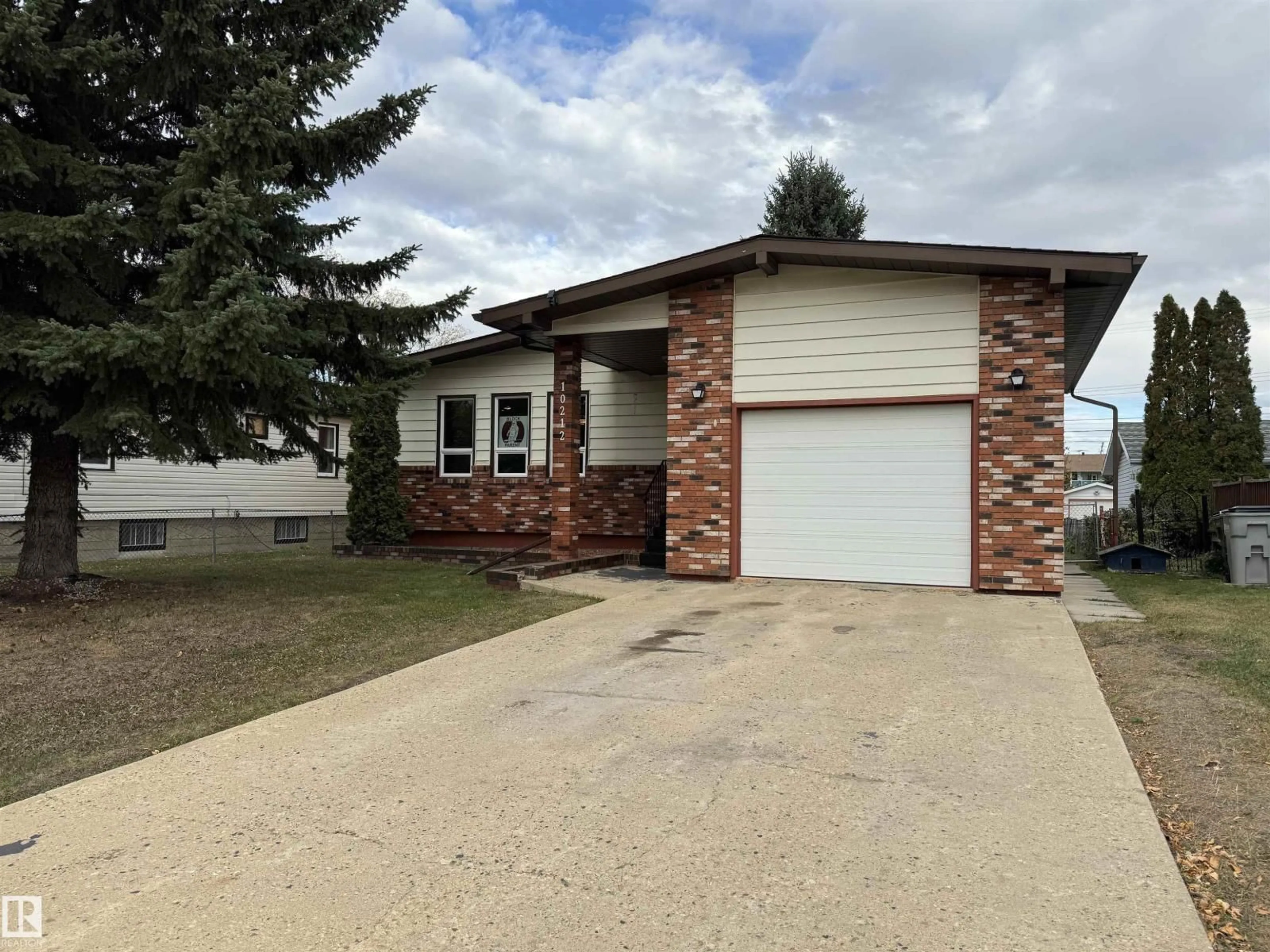 Home with vinyl exterior material, street for 10212 105 ST, Westlock Alberta T7P1W1
