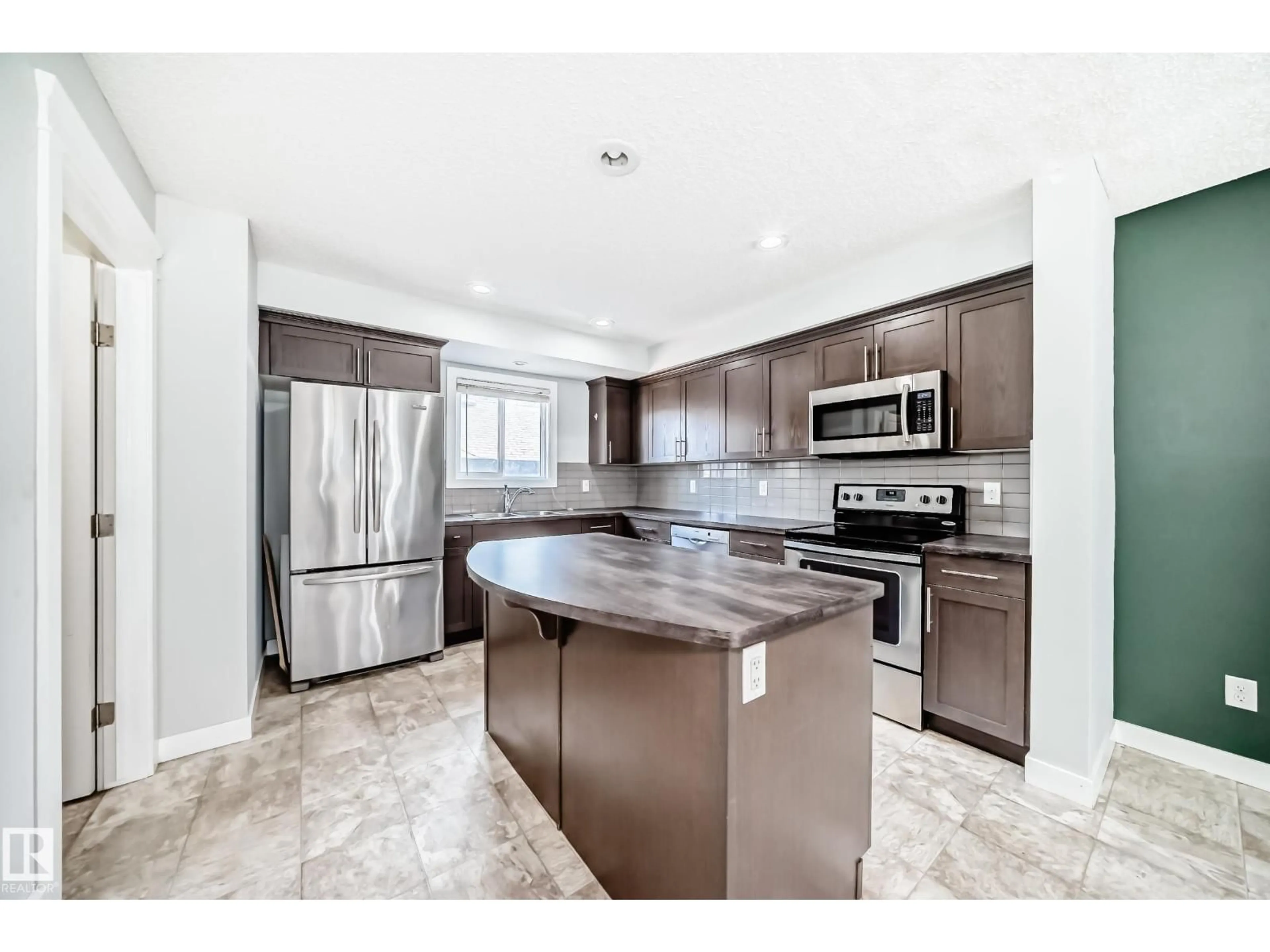 Open concept kitchen, ceramic/tile floor for SW - 1611 52 ST, Edmonton Alberta T6X1X9
