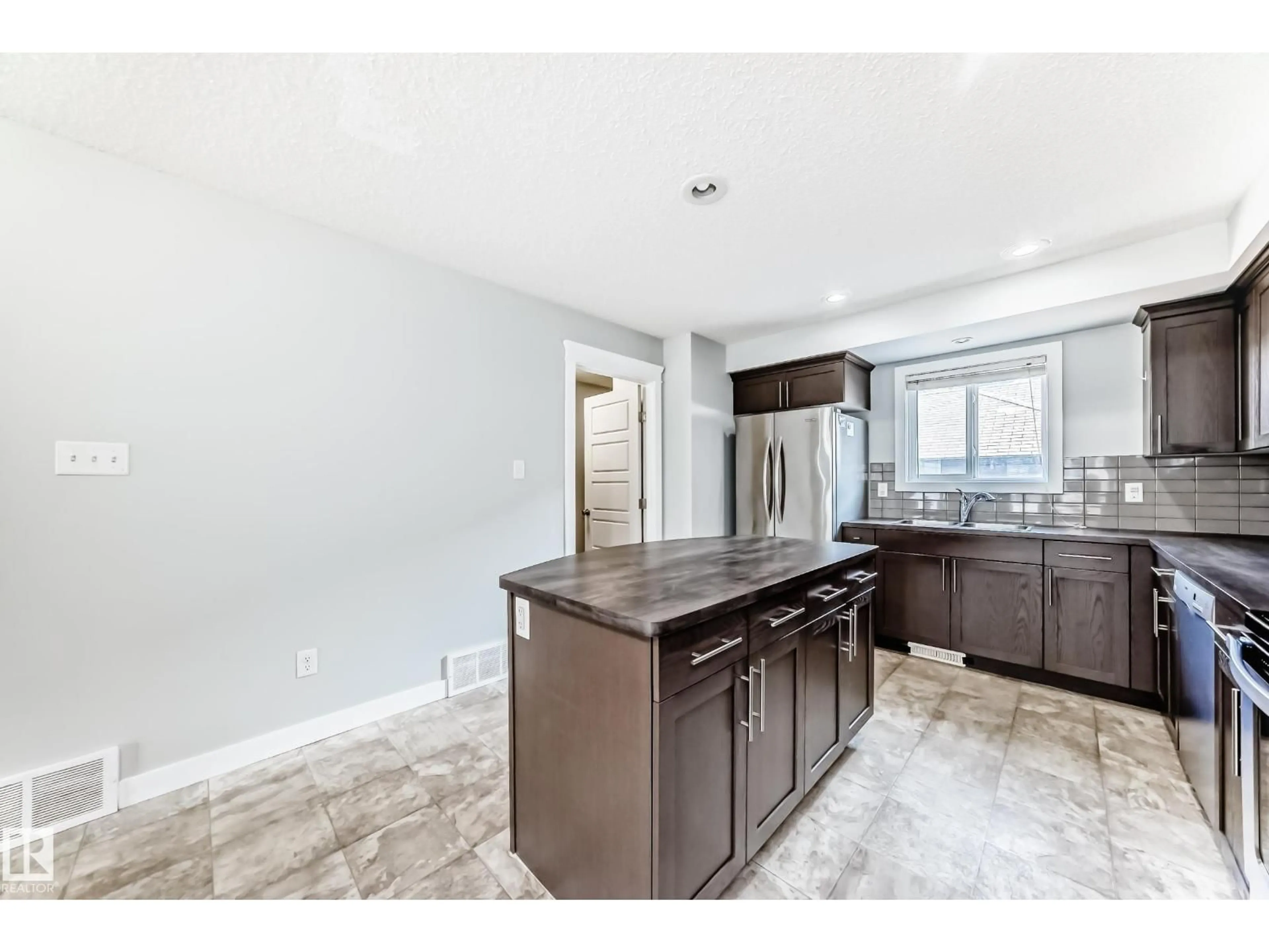 Open concept kitchen, ceramic/tile floor for SW - 1611 52 ST, Edmonton Alberta T6X1X9