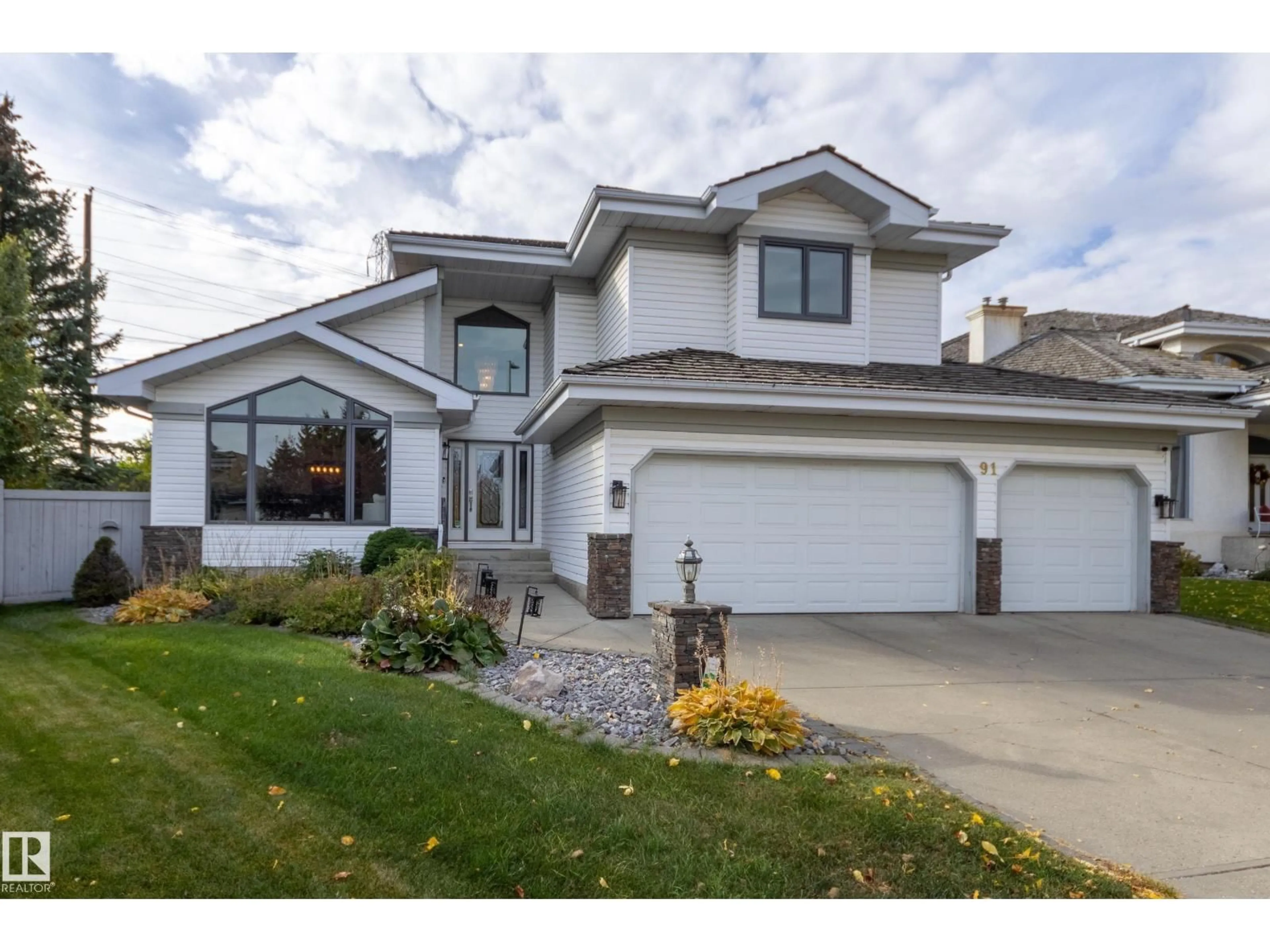 Home with vinyl exterior material, street for 91 CORMACK CR, Edmonton Alberta T6R2E5