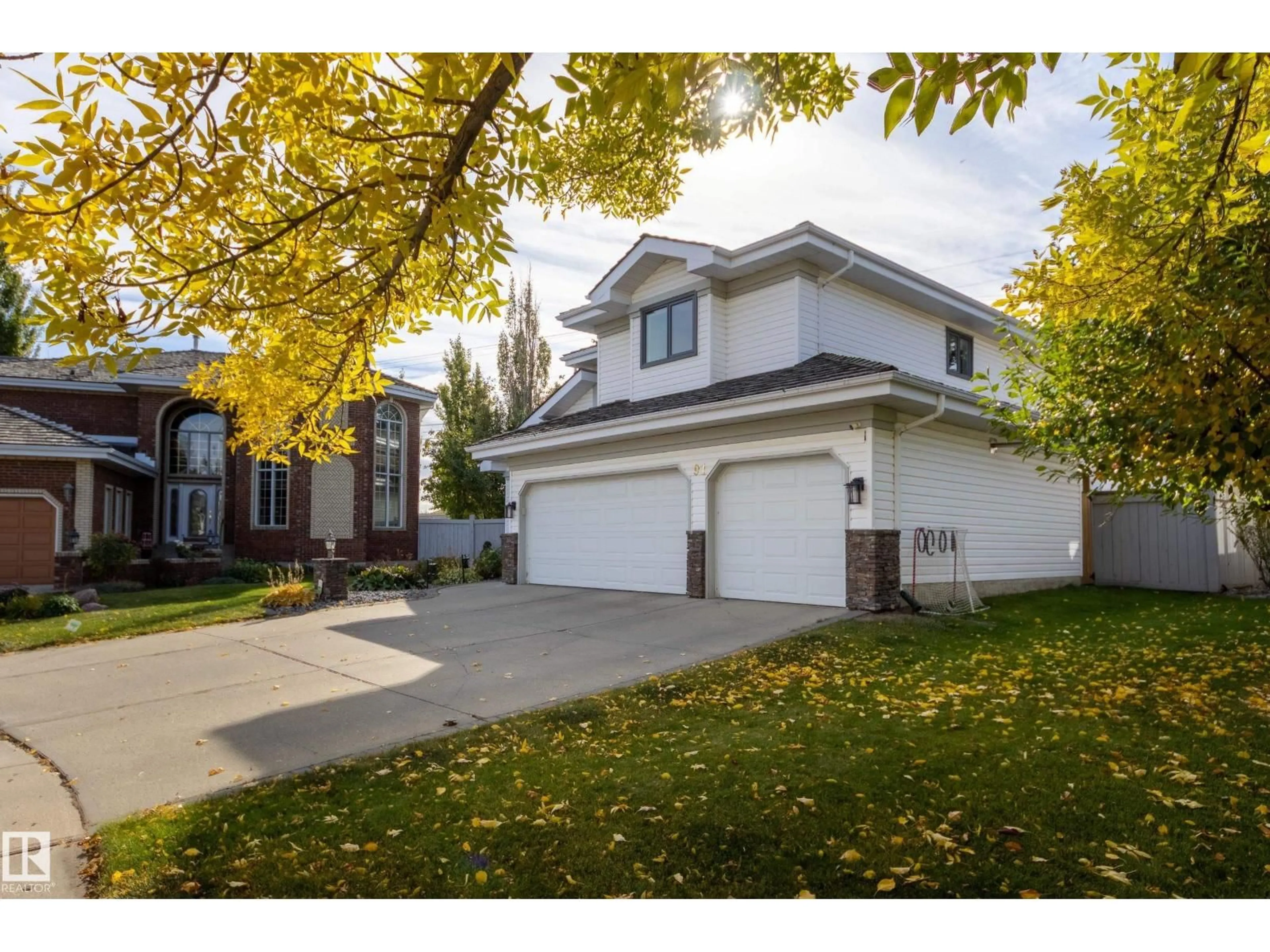 Home with vinyl exterior material, street for 91 CORMACK CR, Edmonton Alberta T6R2E5