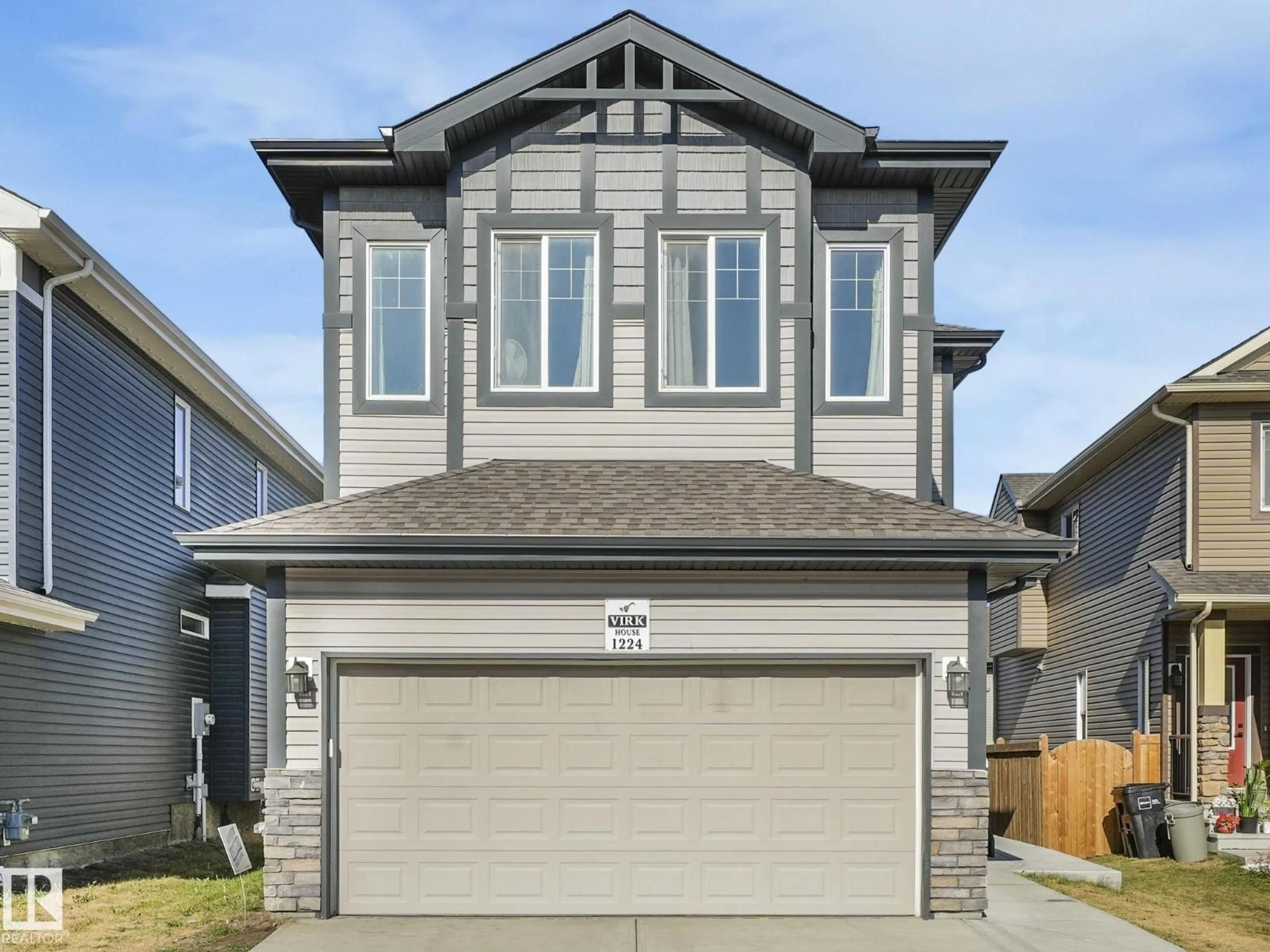 Home with vinyl exterior material, street for NW - 1224 25 AV, Edmonton Alberta T6T2E5