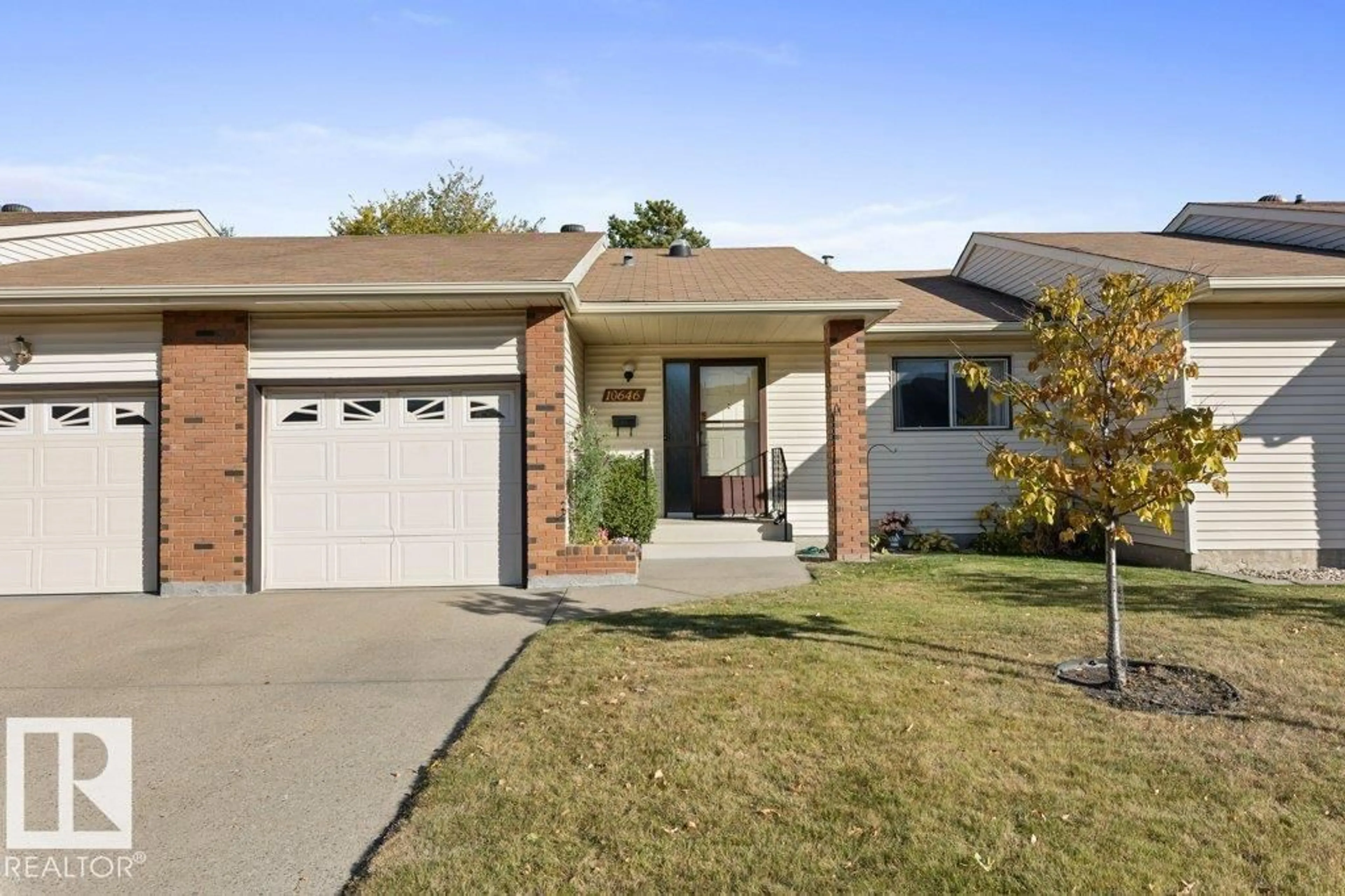 Home with brick exterior material, street for NW - 10646 153 AV, Edmonton Alberta T5X5R8