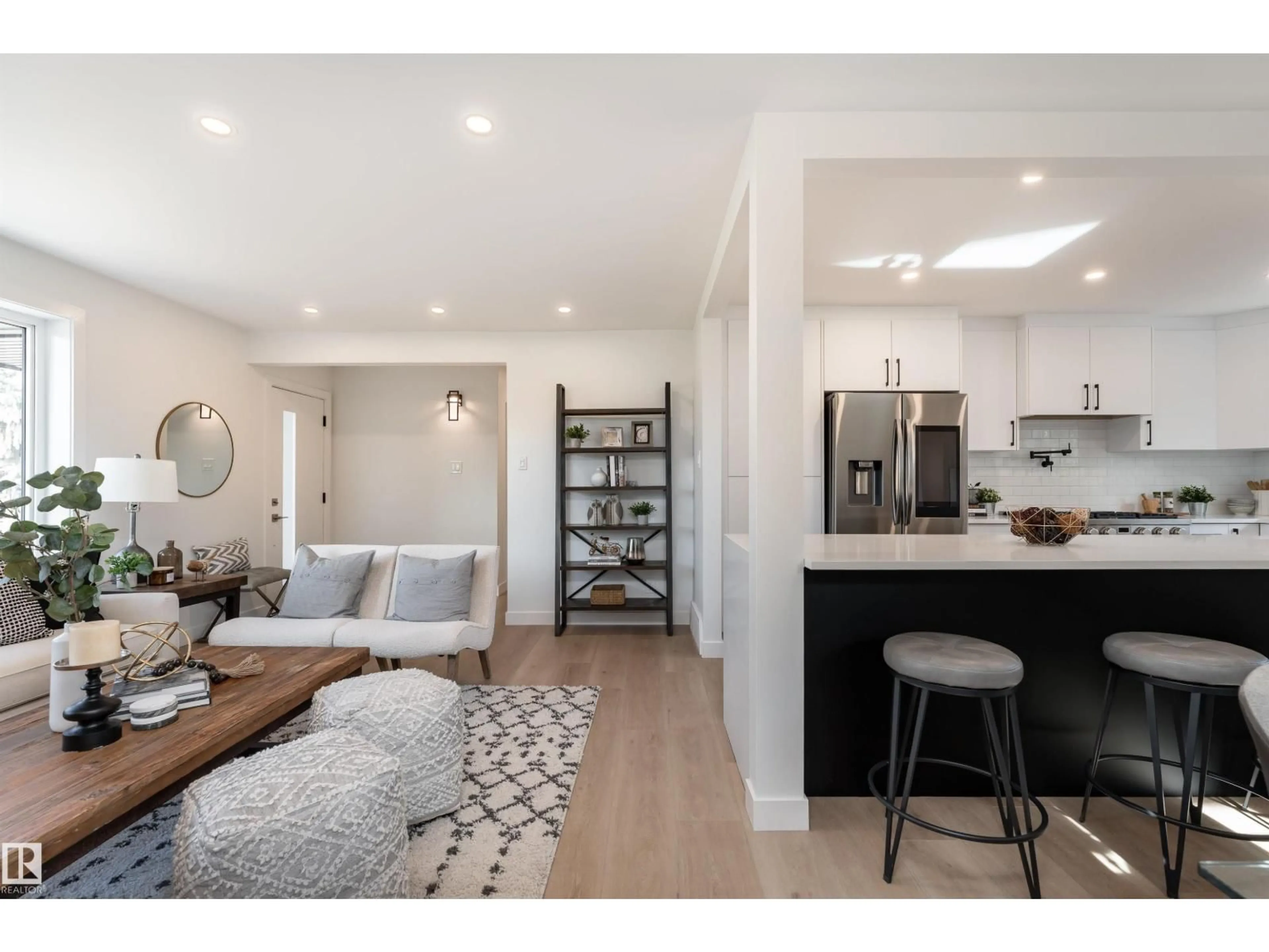 Open concept kitchen, wood/laminate floor for NW - 8707 54 ST, Edmonton Alberta T6B1H2