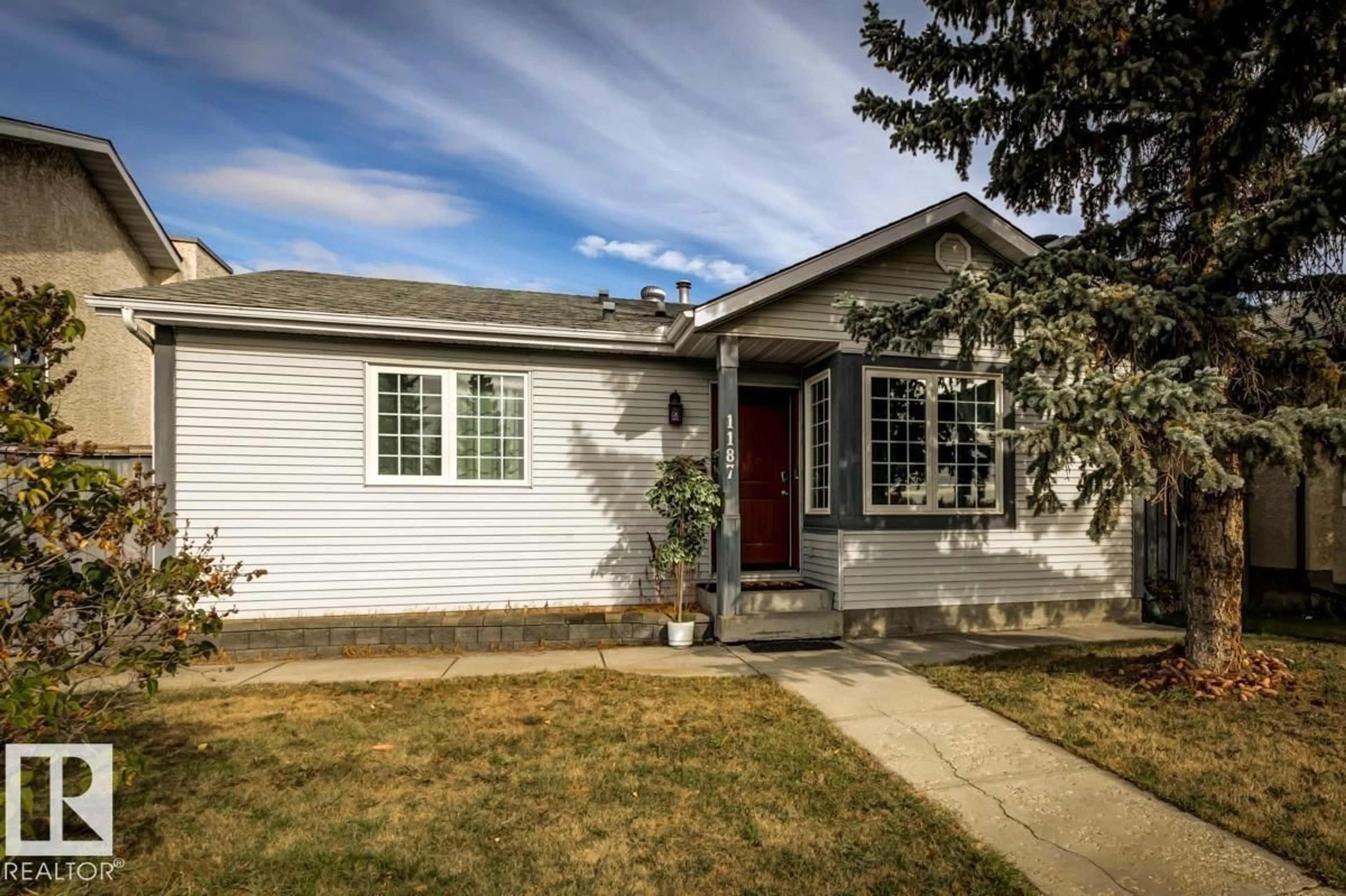 Home with vinyl exterior material, street for 1187 LAKEWOOD RD, Edmonton Alberta T6K4C6